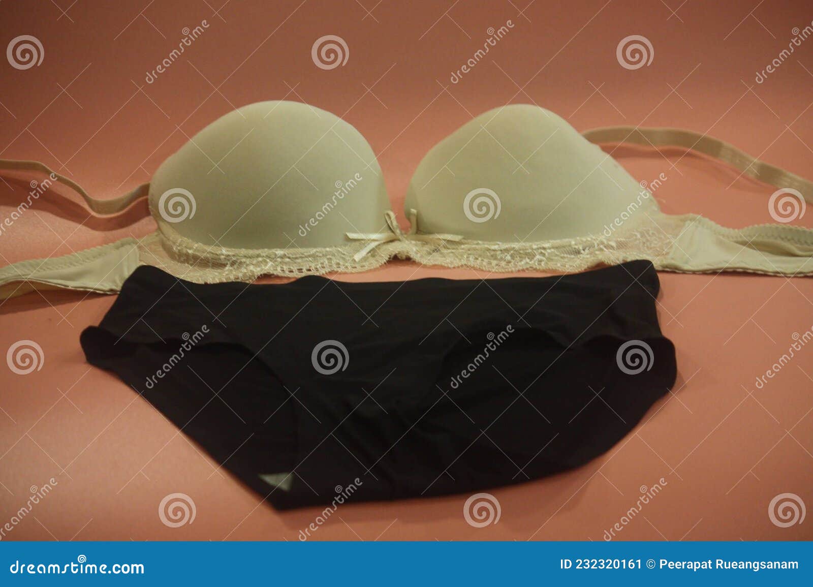 Close-up Shot of Multi Colored Seamless Smooth Push Up Bra and Black  Seamless Hipster Panty on the Pink Background. Stock Image - Image of shot,  smooth: 232320161
