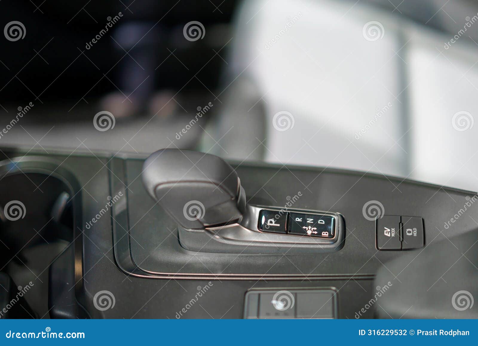 close up of modern car automatic gearbox and control buttons in ev car