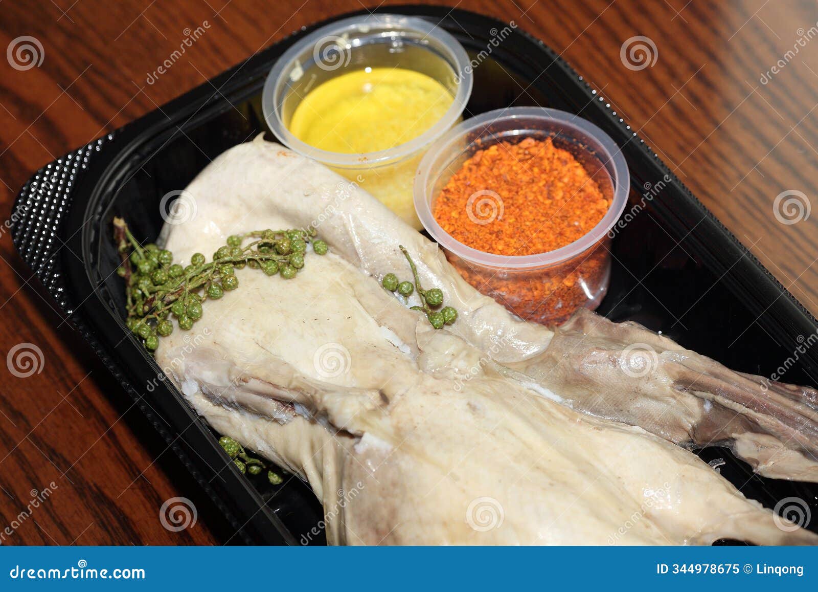 close-up shots of chinese nanjing delicacies - salted duck and dipping sauce
