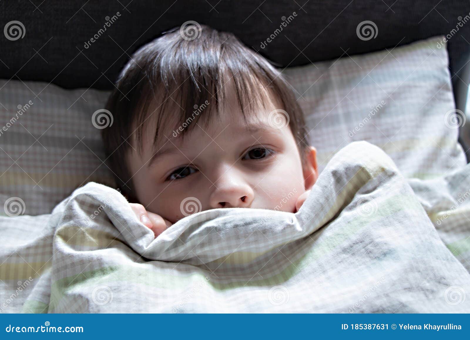 Sick Boy with a Fever Lying on the Bed Covered with a Blanket Stock Image Image of heal