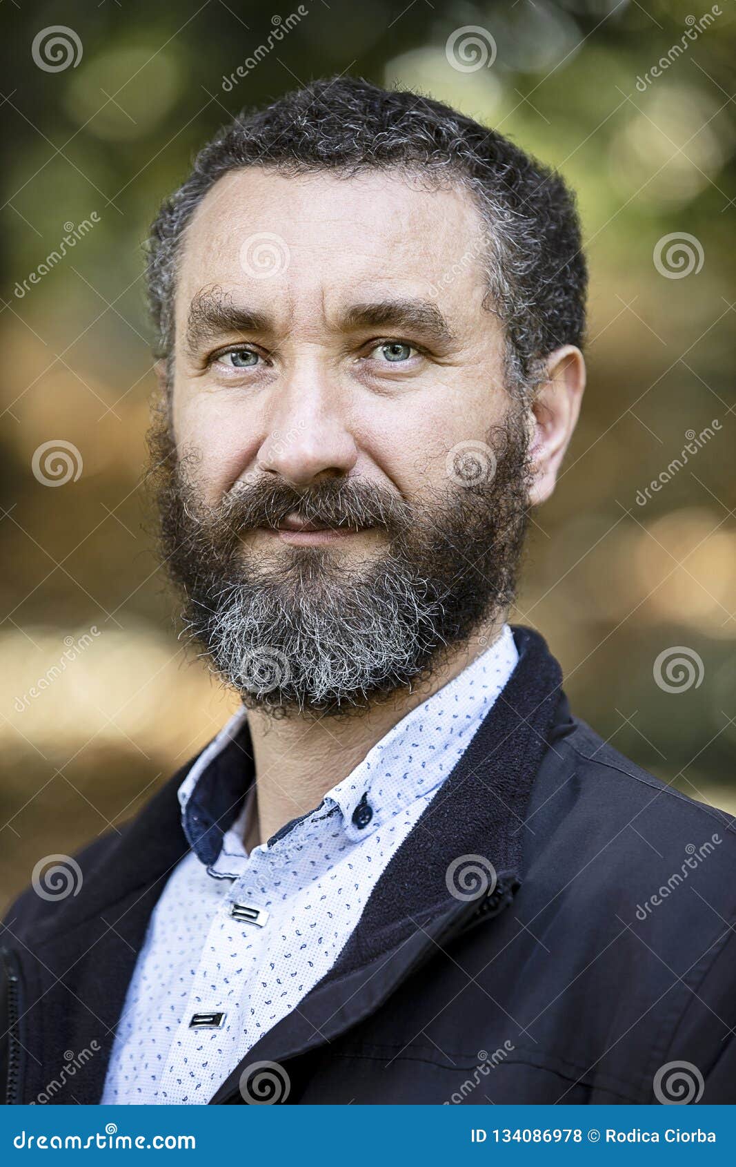 Portrait Of Handsome Mature Man Curly Black And Gray Hair Stock Photo -  Image Of Outdoors, Beard: 134086978