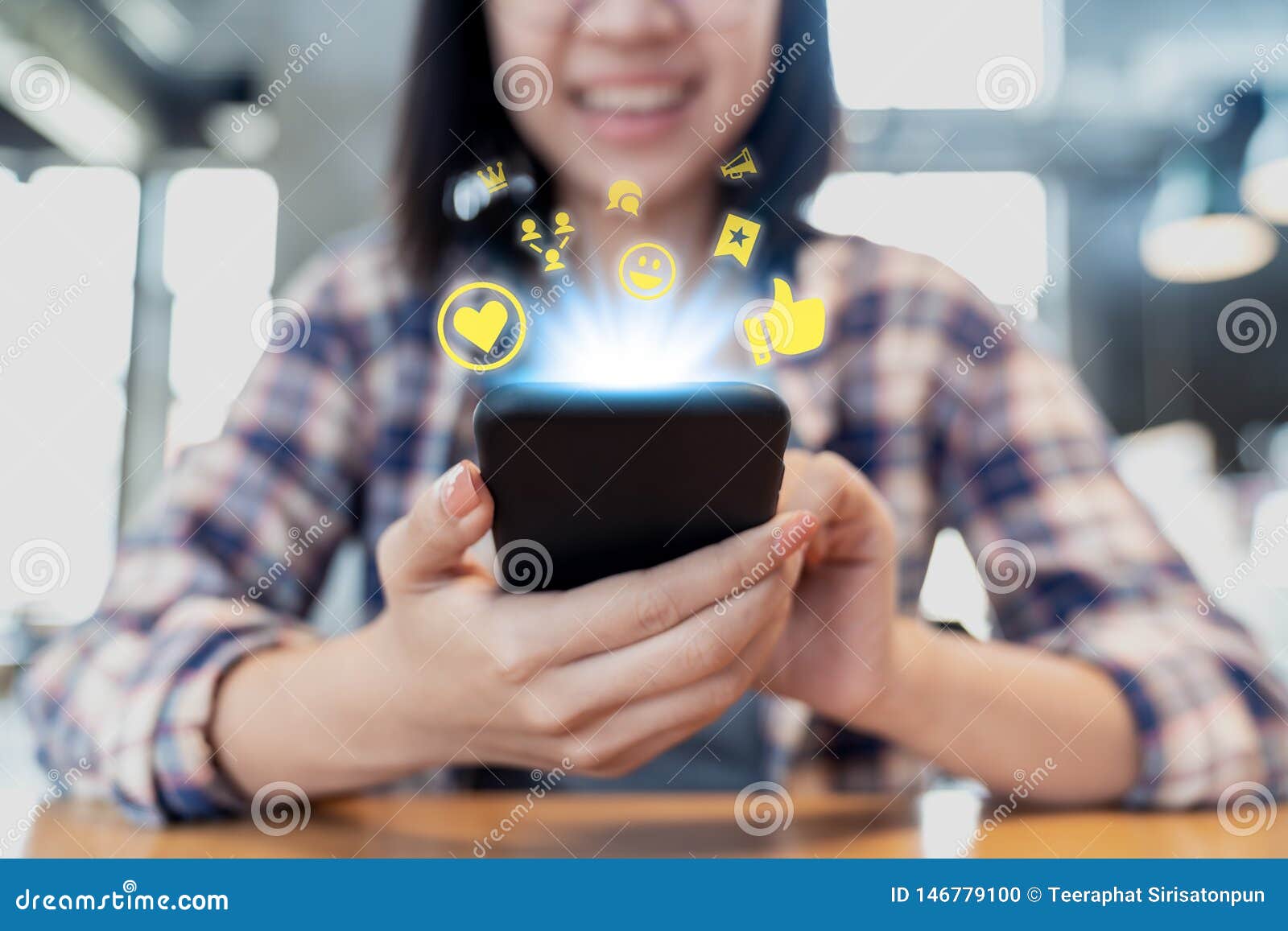 close up smartphone social media network sharing and commenting in online community. influencer woman`s hand holding mobile phone