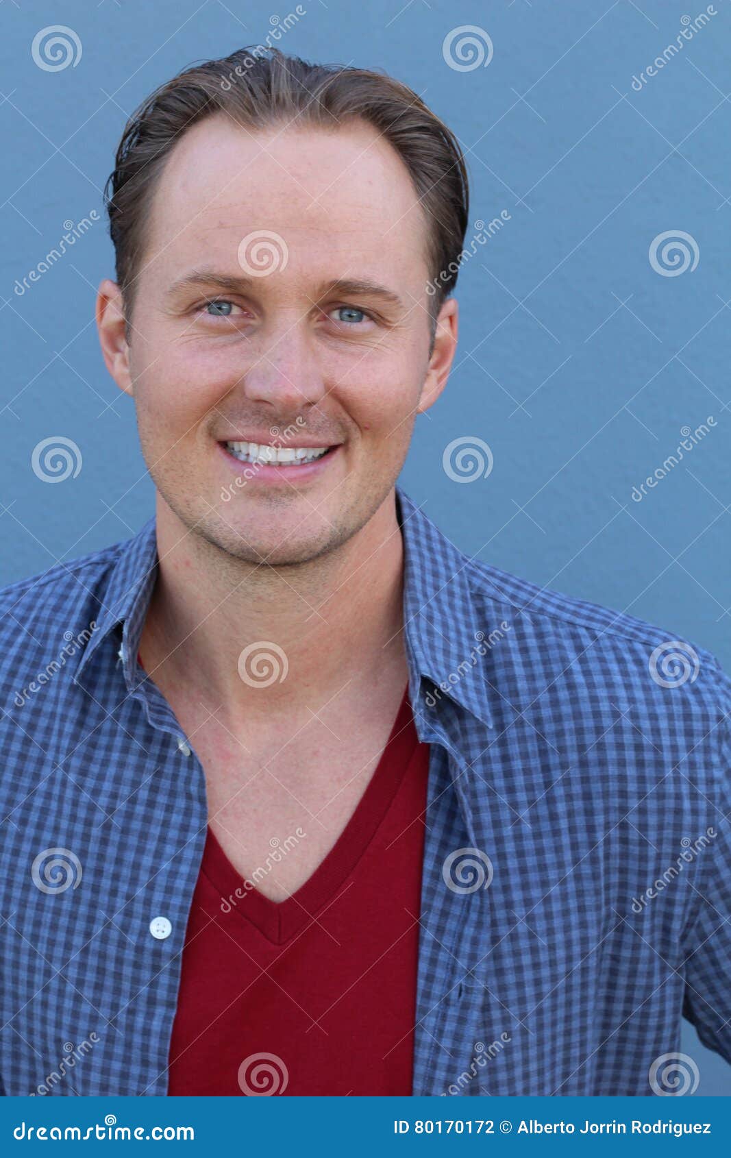 Close Up of Smiling Adult Male in Light Blue Shirt, Red V-neck ...