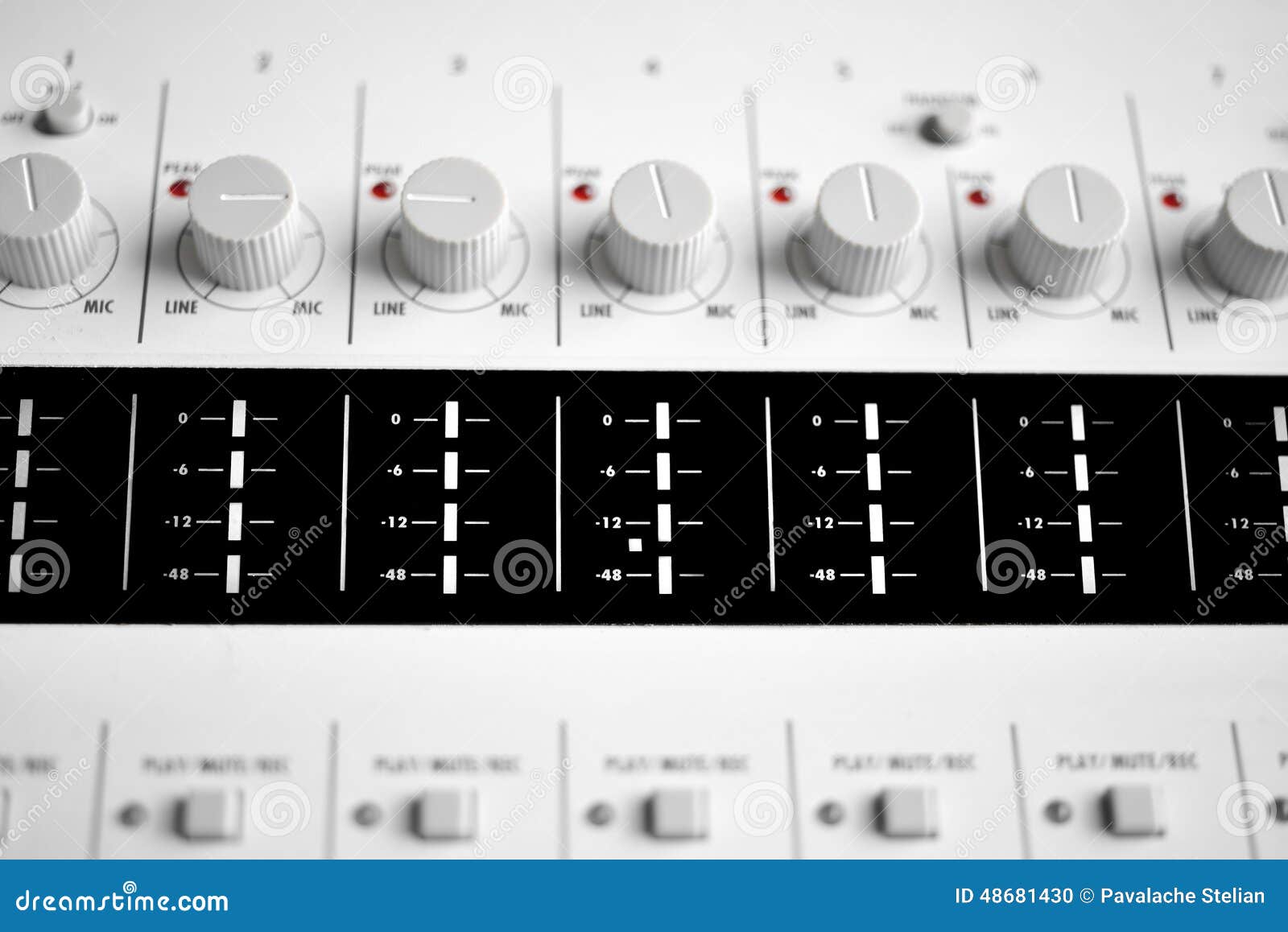 close up of a sound mixer knobs