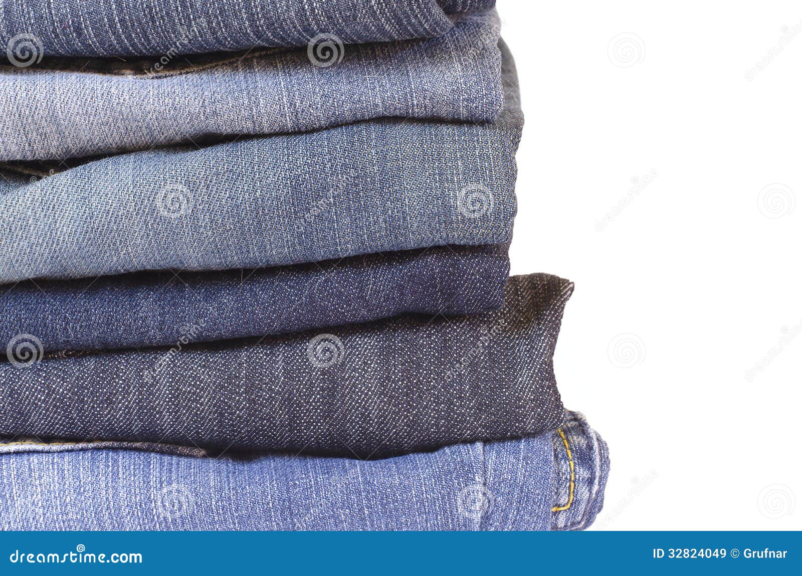 Close Up Stack of Folded Jeans on White Background Stock Image - Image ...