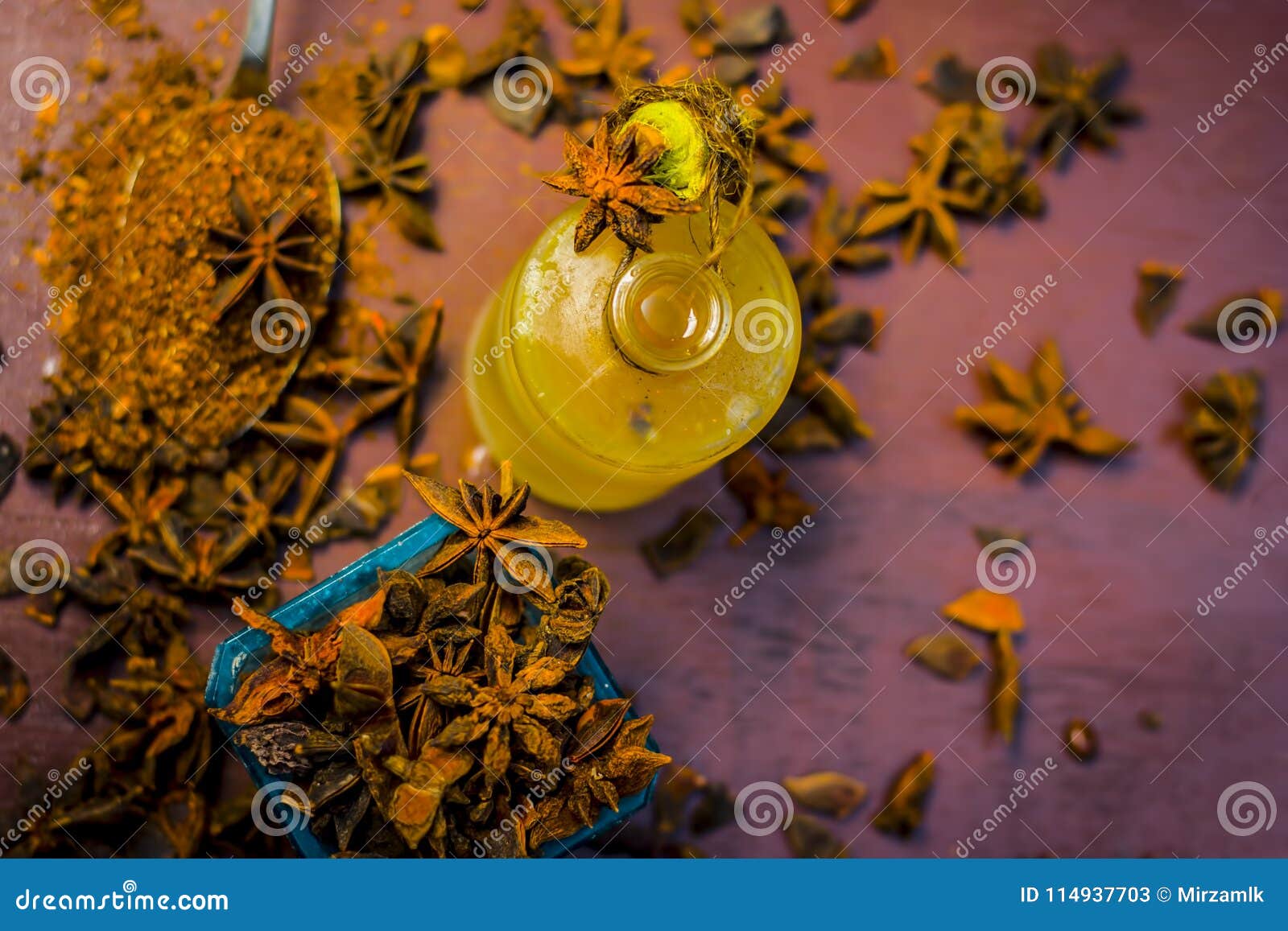 Oil of Star Anise in a Bottle with Raw Anise. Stock Image - Image of ...