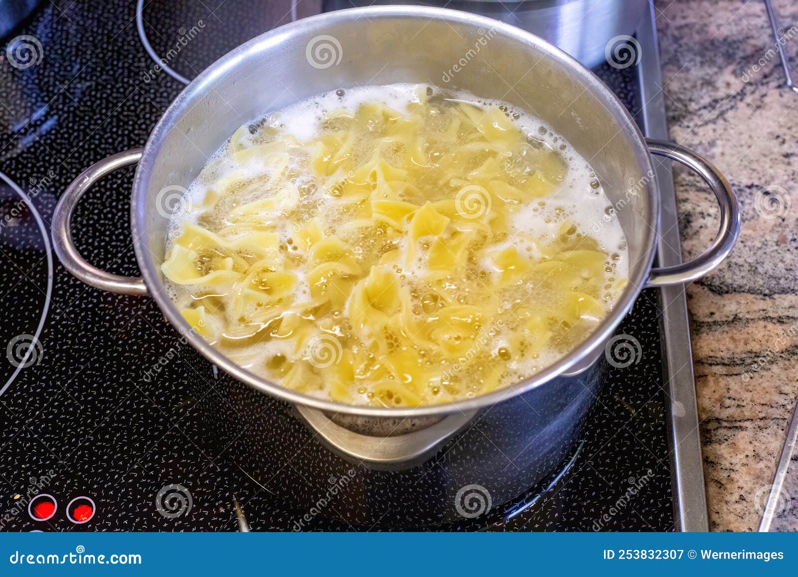 Closeup of a Stove with Pot and Pasta Stock Image Image of household