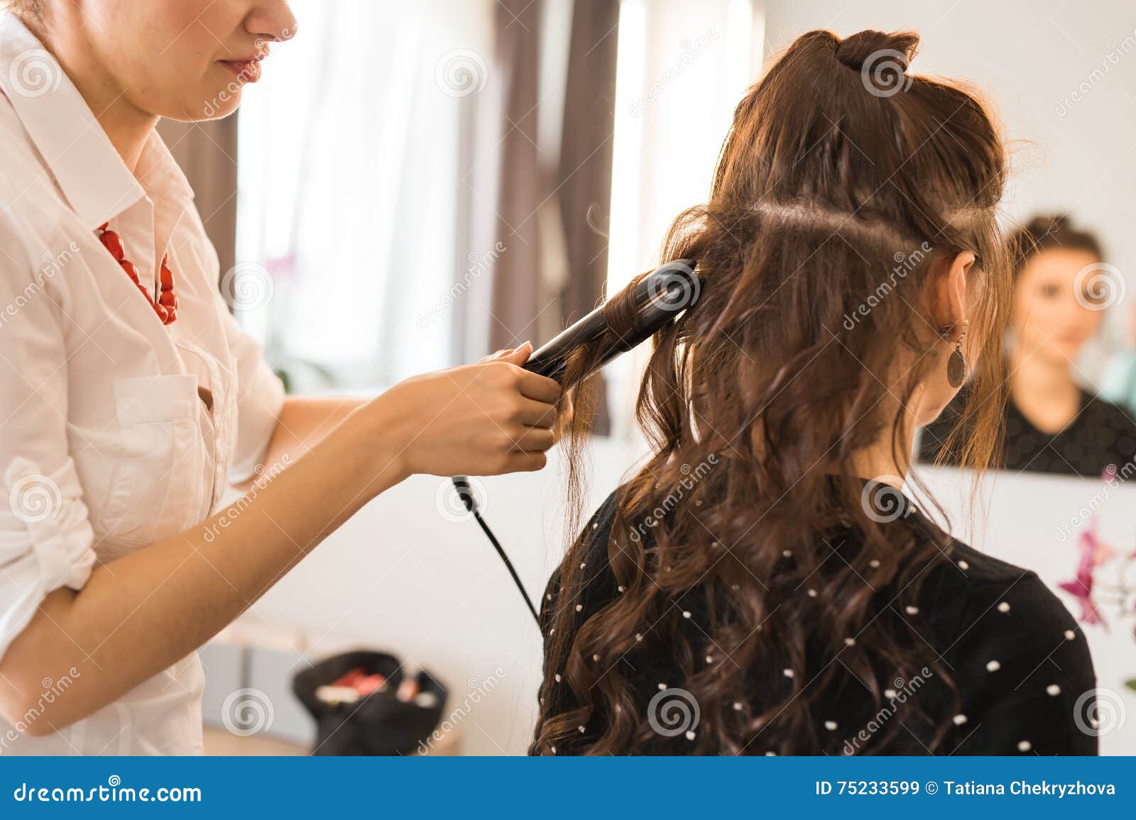 Close Up of Stylist S Hand Using Curling Iron for Hair Curls. Stock Image Image of equipment