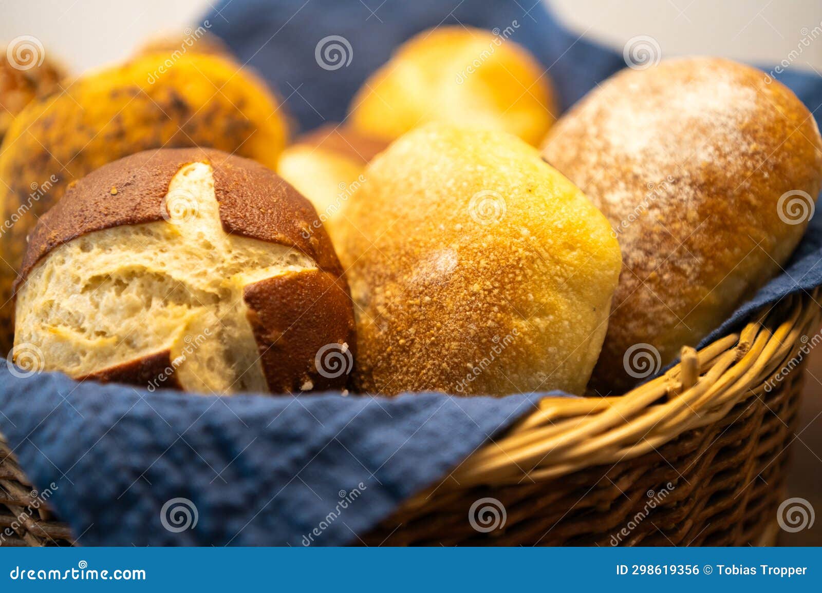 close-up of swabian german bread basket with organic baked goods on bakery counter