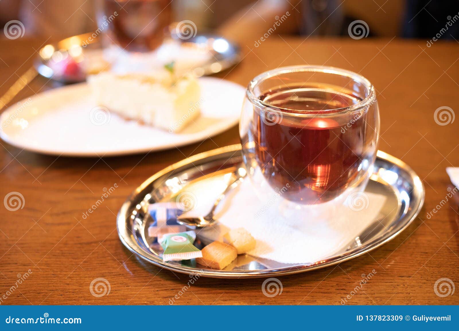 Close Up Tea Cup on Table in Cafe with Blur Light Bokeh Stock Image