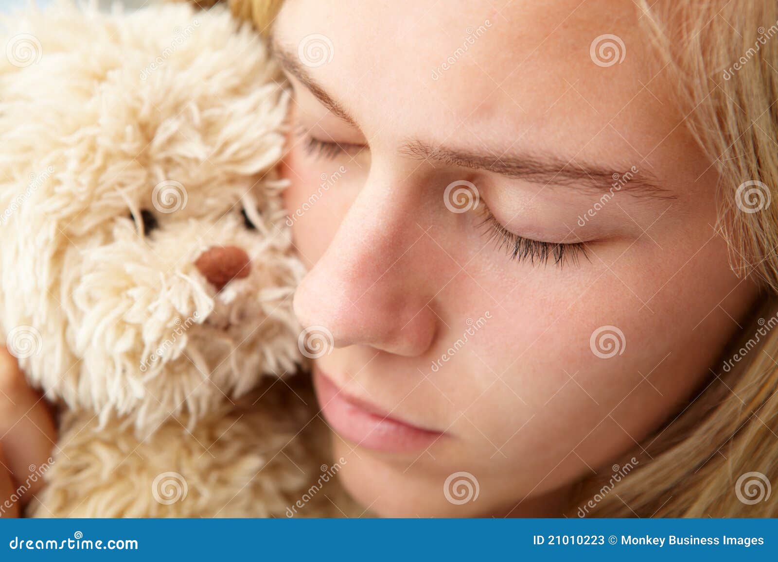 close up teenage girl with cuddly toy