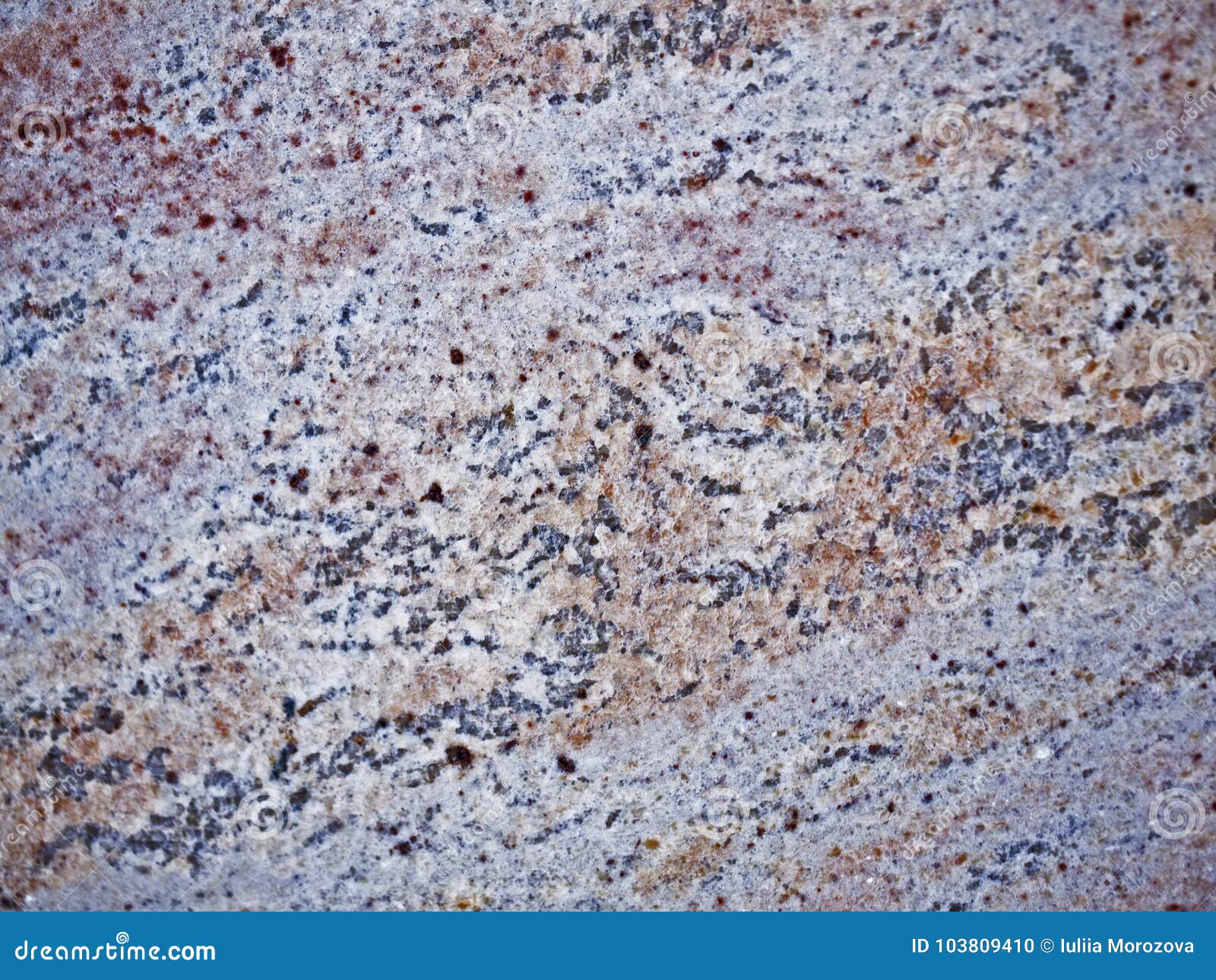 A Closeup of a Texture of a Polished Grey Granite Stone Surface Stock