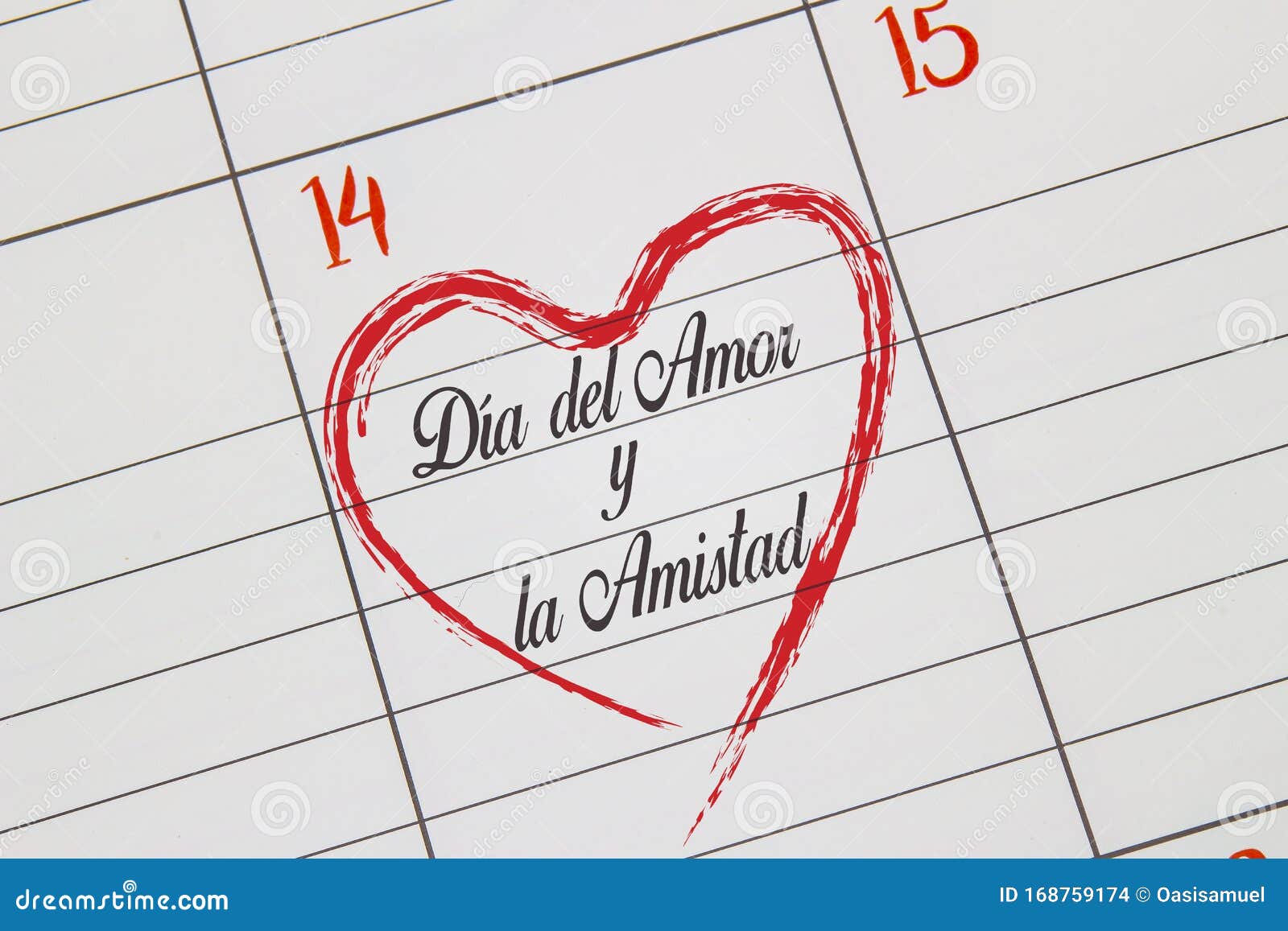 a close up to a calendar on feb 14 with the text on spanish: `dÃÂ­a del amor y la amistad` in english day of love and friendsh