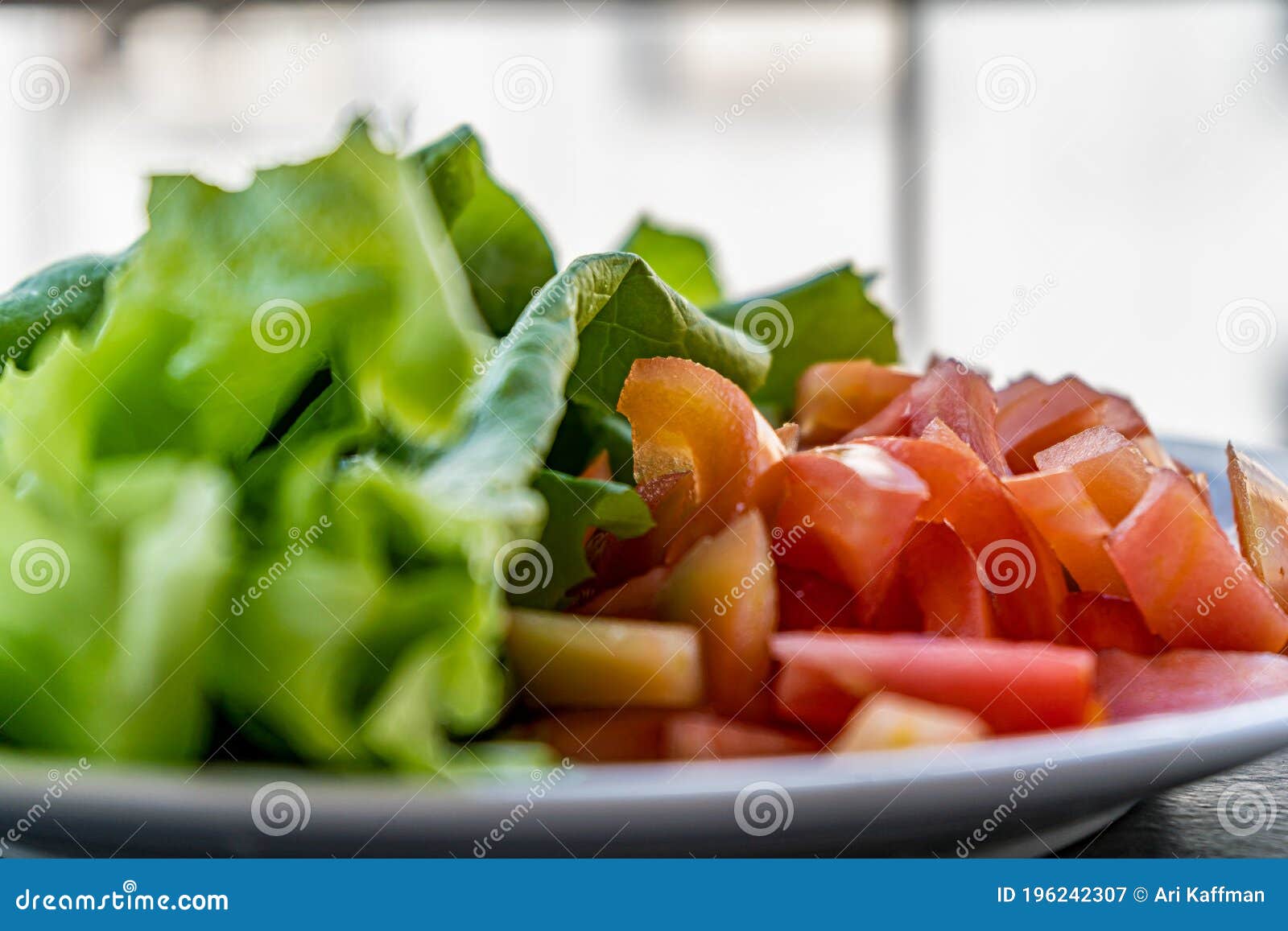close up of tomatoes and lettuce