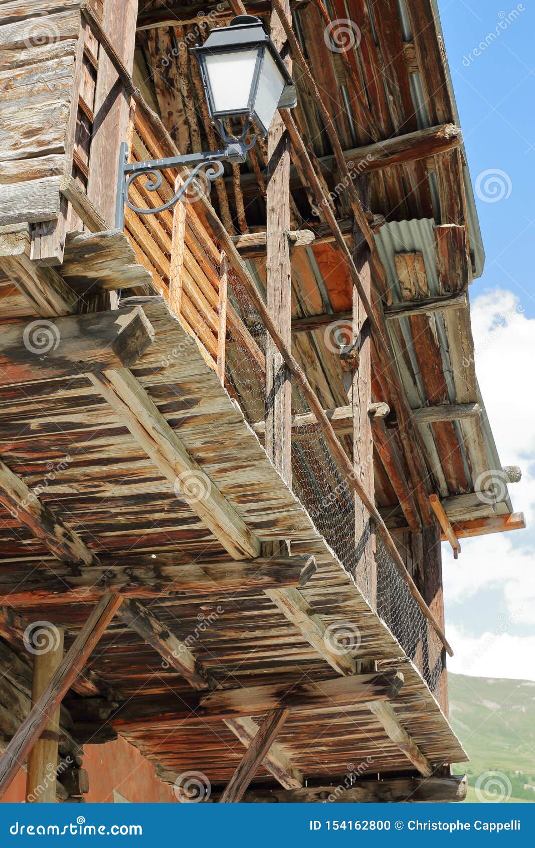 close-up on a traditional wooden house with its traditional balcony in saint veran village