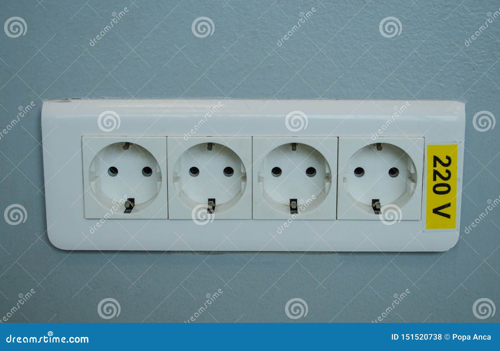 Close Up of a Triple Wall Jack, 220 V, Electric Symbol Stock Photo