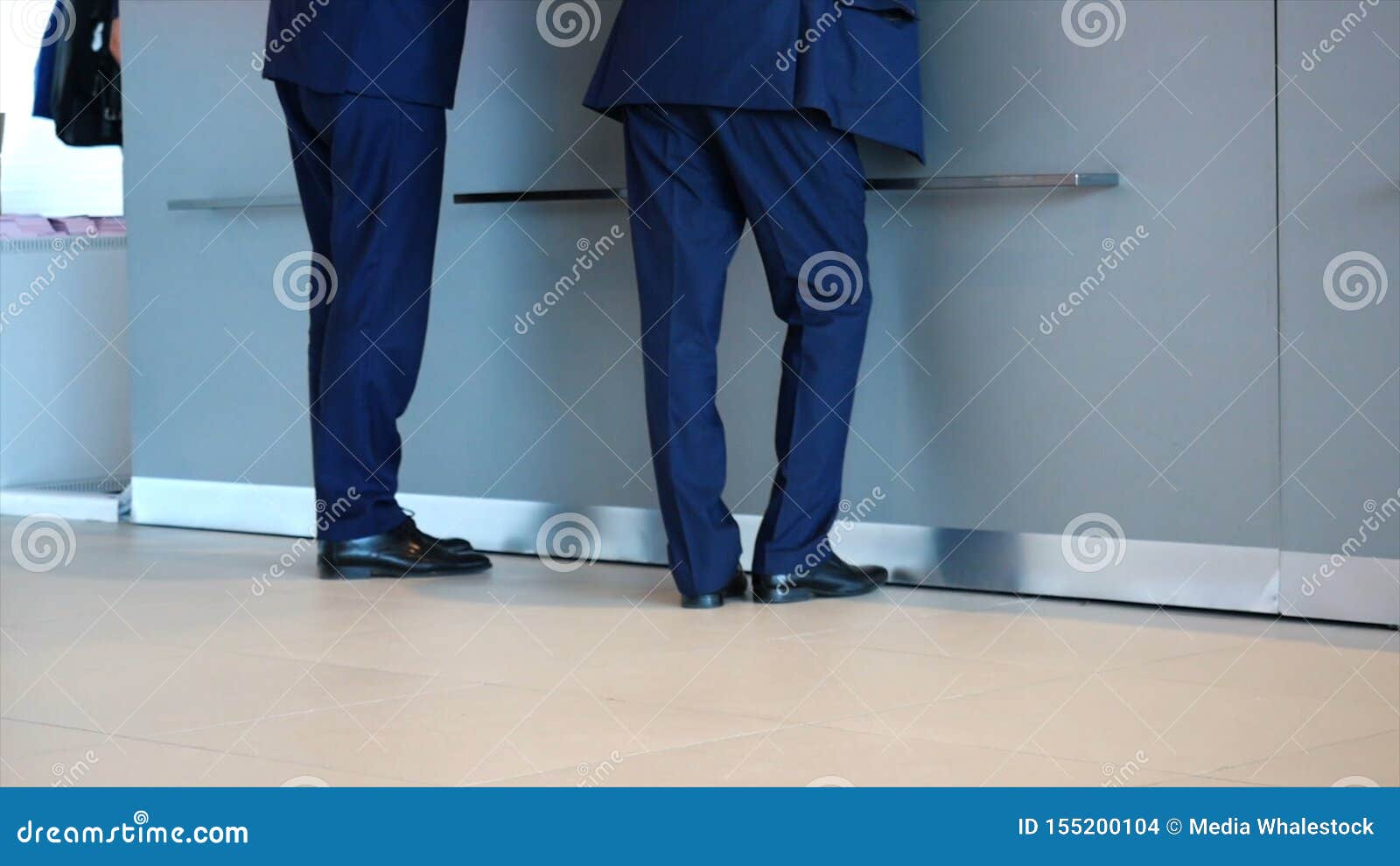 blue trousers black shoes