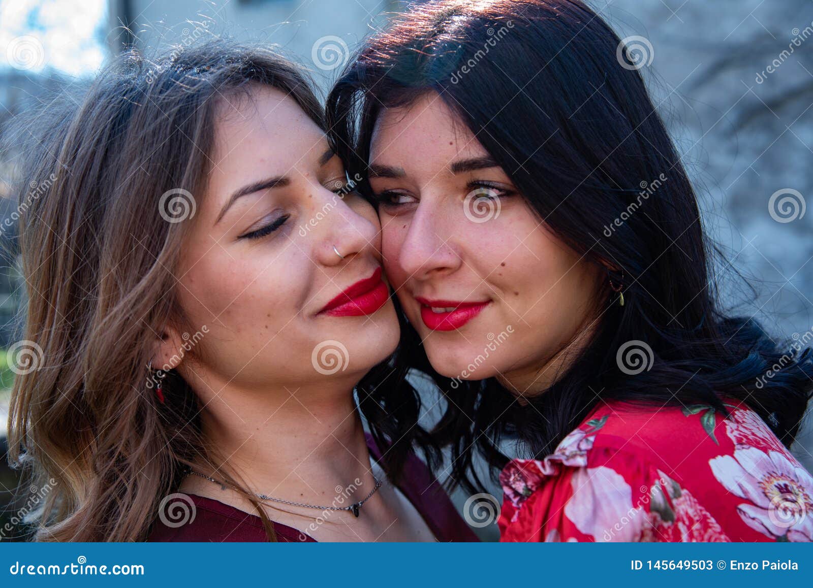 Close Up Of Two Lesbian Friends With Their Cheeks Resting