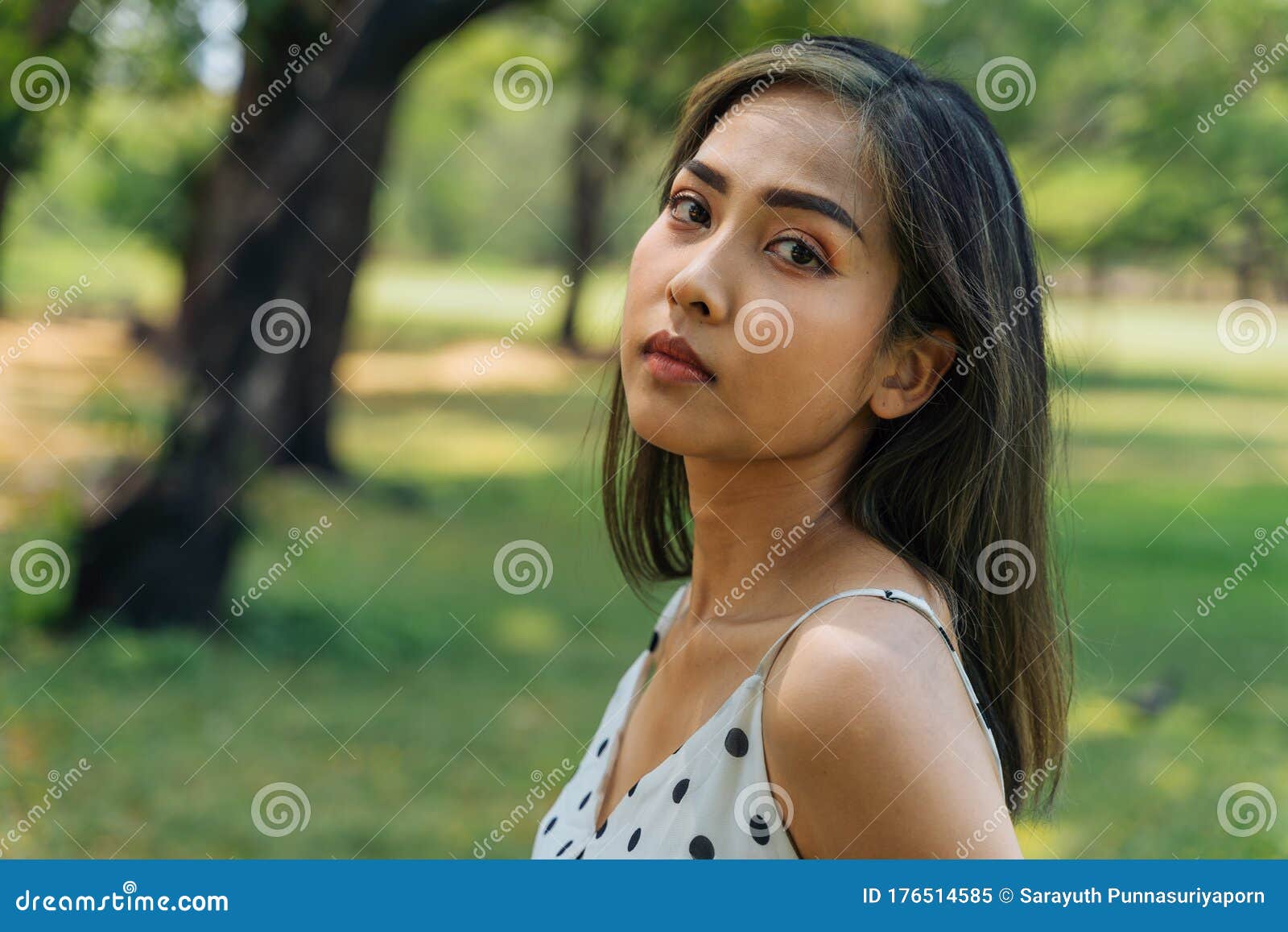 Close-up of Unhappy Southeast Asian Woman with Tears Looking at ...