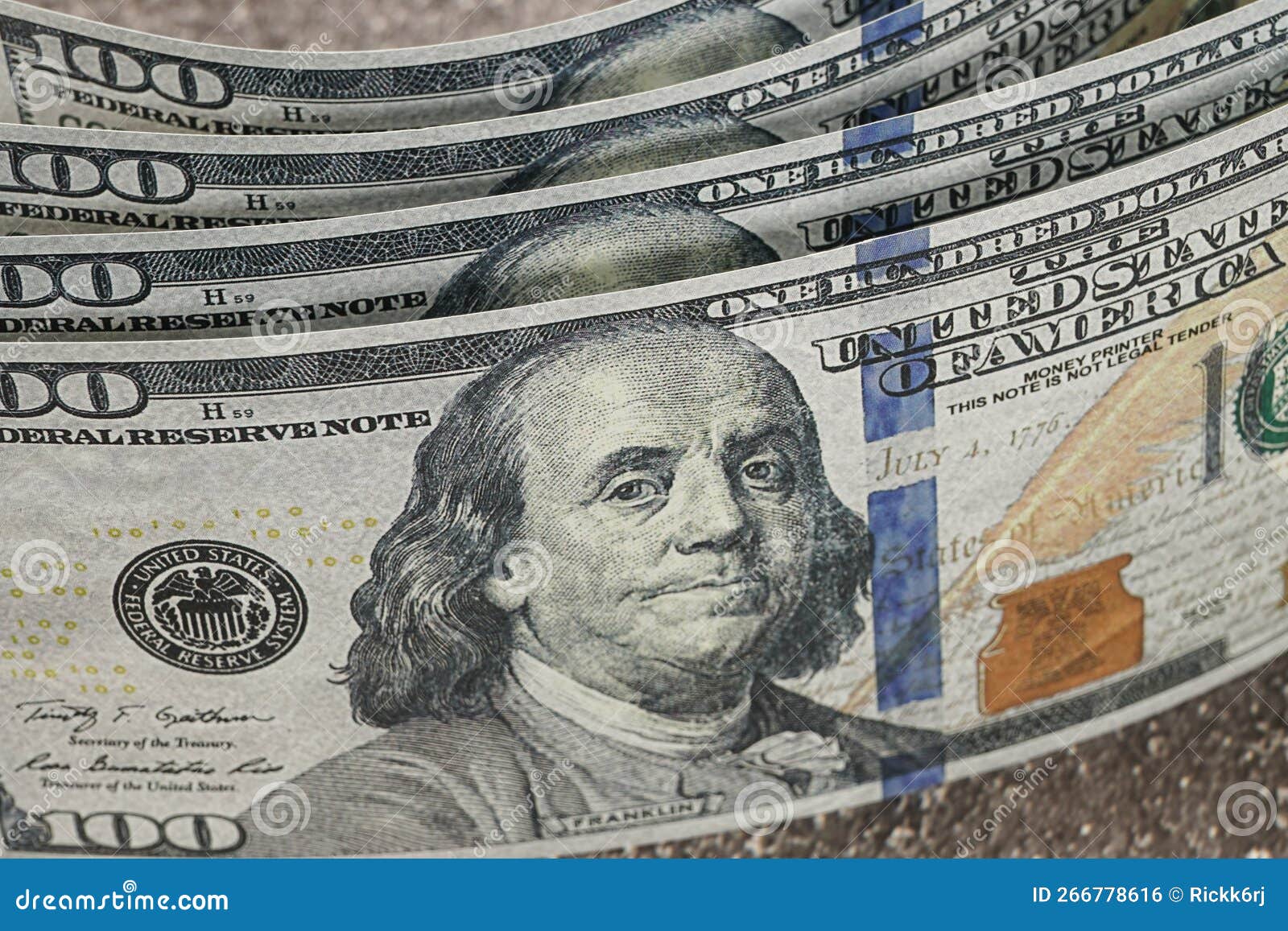 Close Up of US 100 Dollar Bills Staniding on End. Stock Photo Image