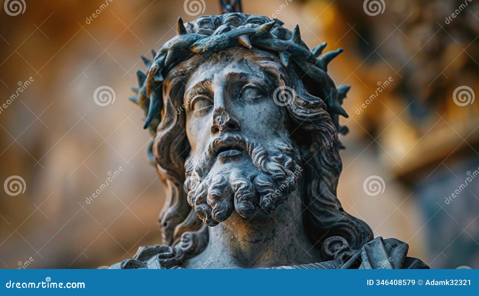 close up view of ancient bronze jesus statue with crown of thorns