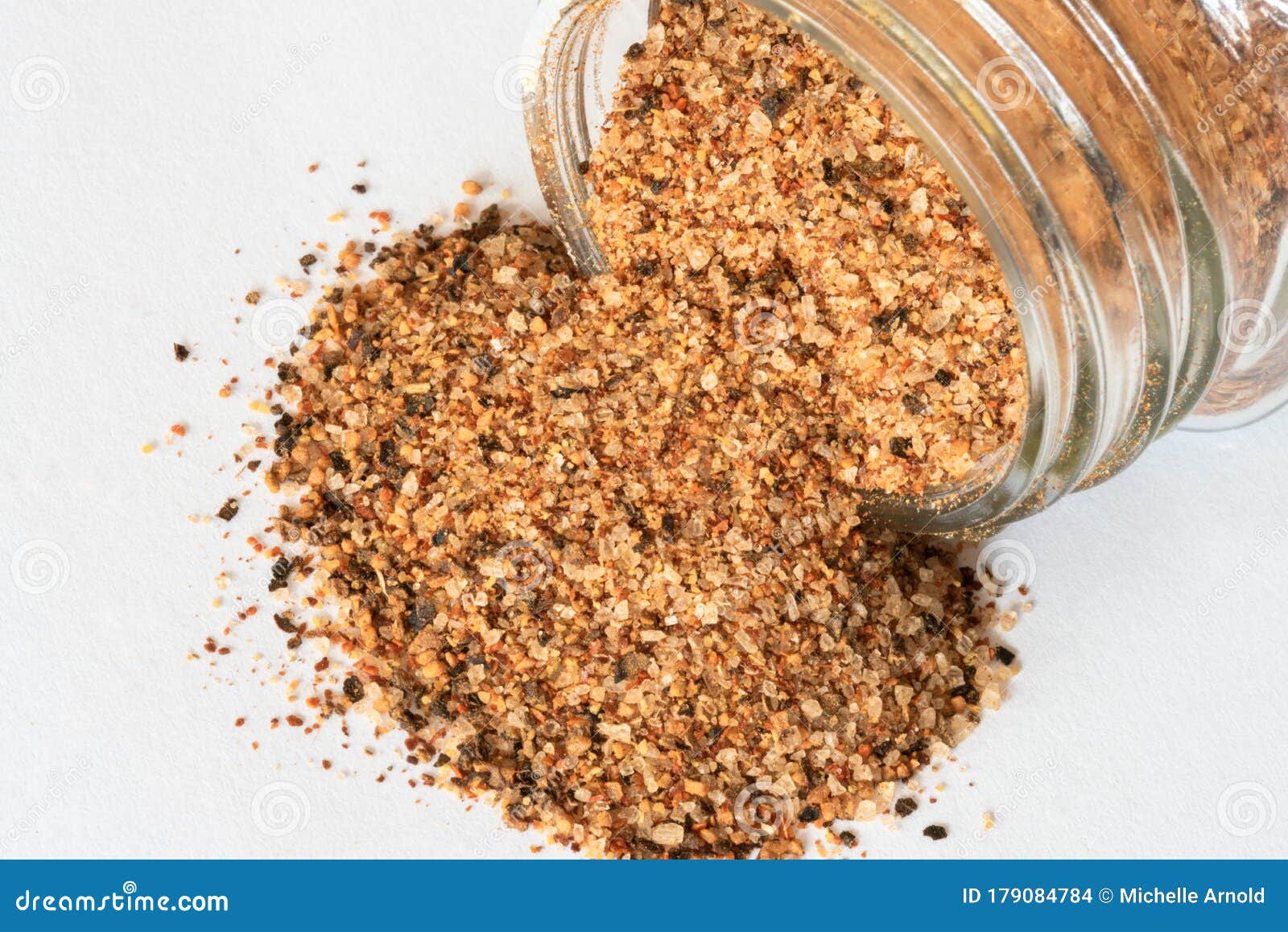 cajun seasoning spilled from a spice jar