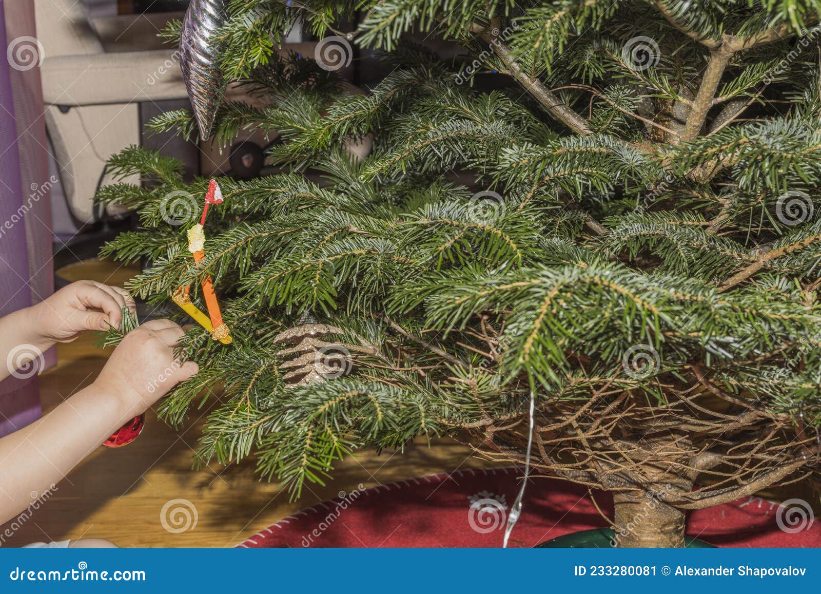 Close Up View of Child Hand Holding Christmas Tree Decoration ...