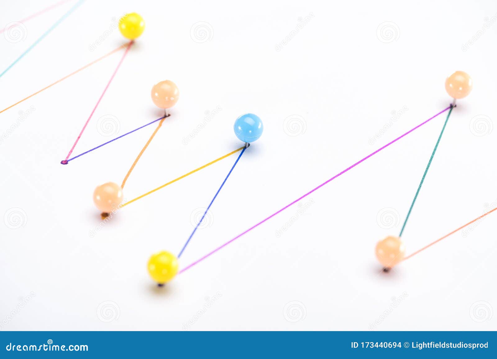 close up view of colorful connected drawn lines with pins, connection concept.