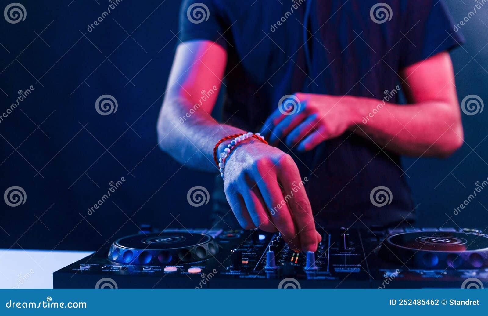 Close Up View of DJ`s Hands that Working with Music Equipment in the