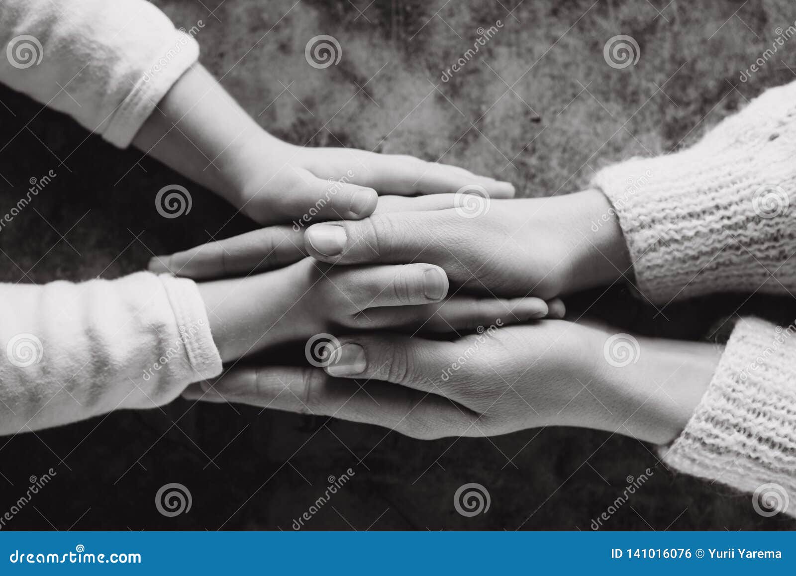 close up view of family holding hands, loving caring mother supporting child. helping hand and hope concept