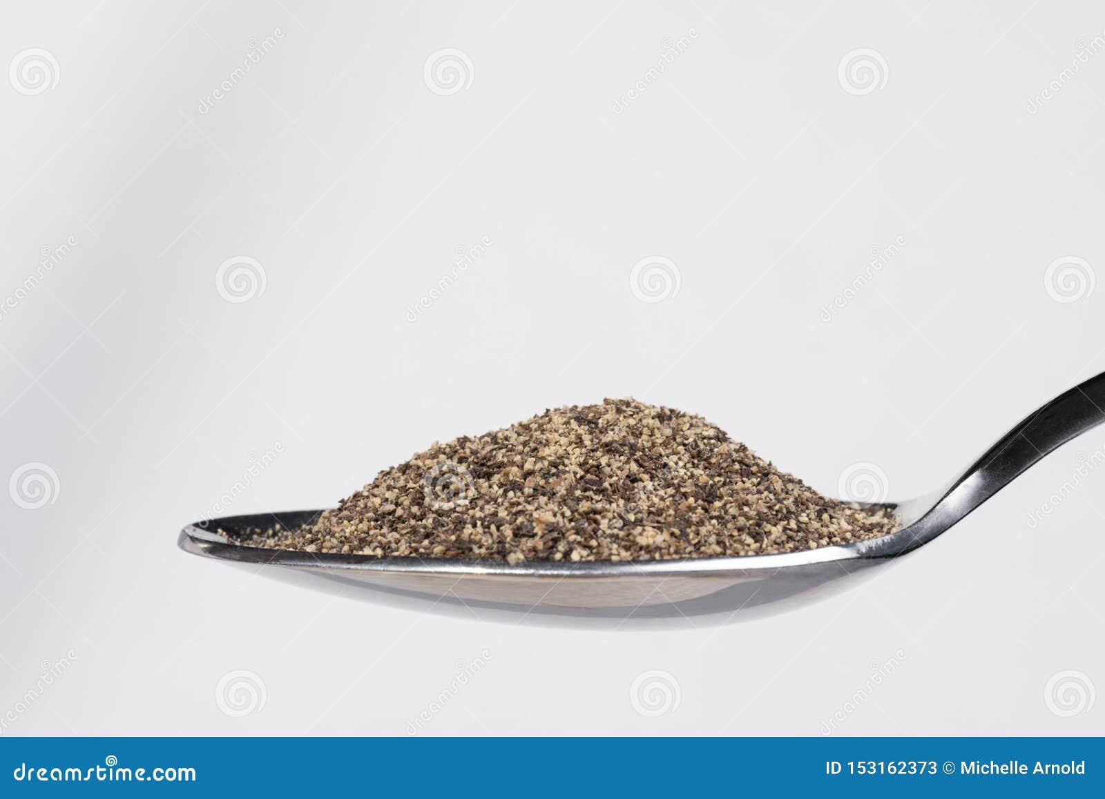 Ground Black Pepper on a Spoon Stock Image Image of close, isolated