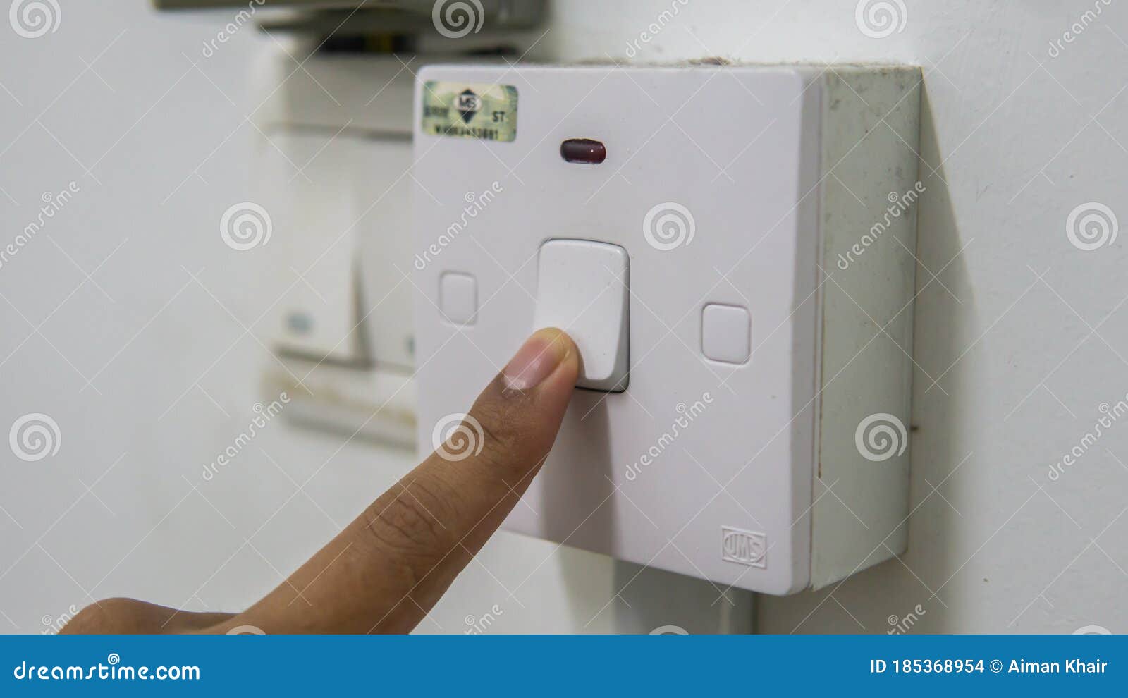 Close Up View Hand Finger Switching Off the Air Conditioner Switch with