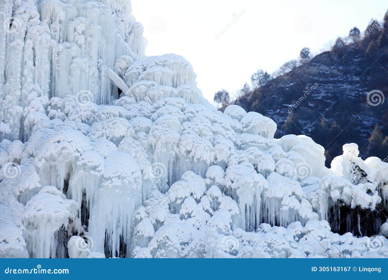 close-up shot of a spectacular icefall in the mountains.