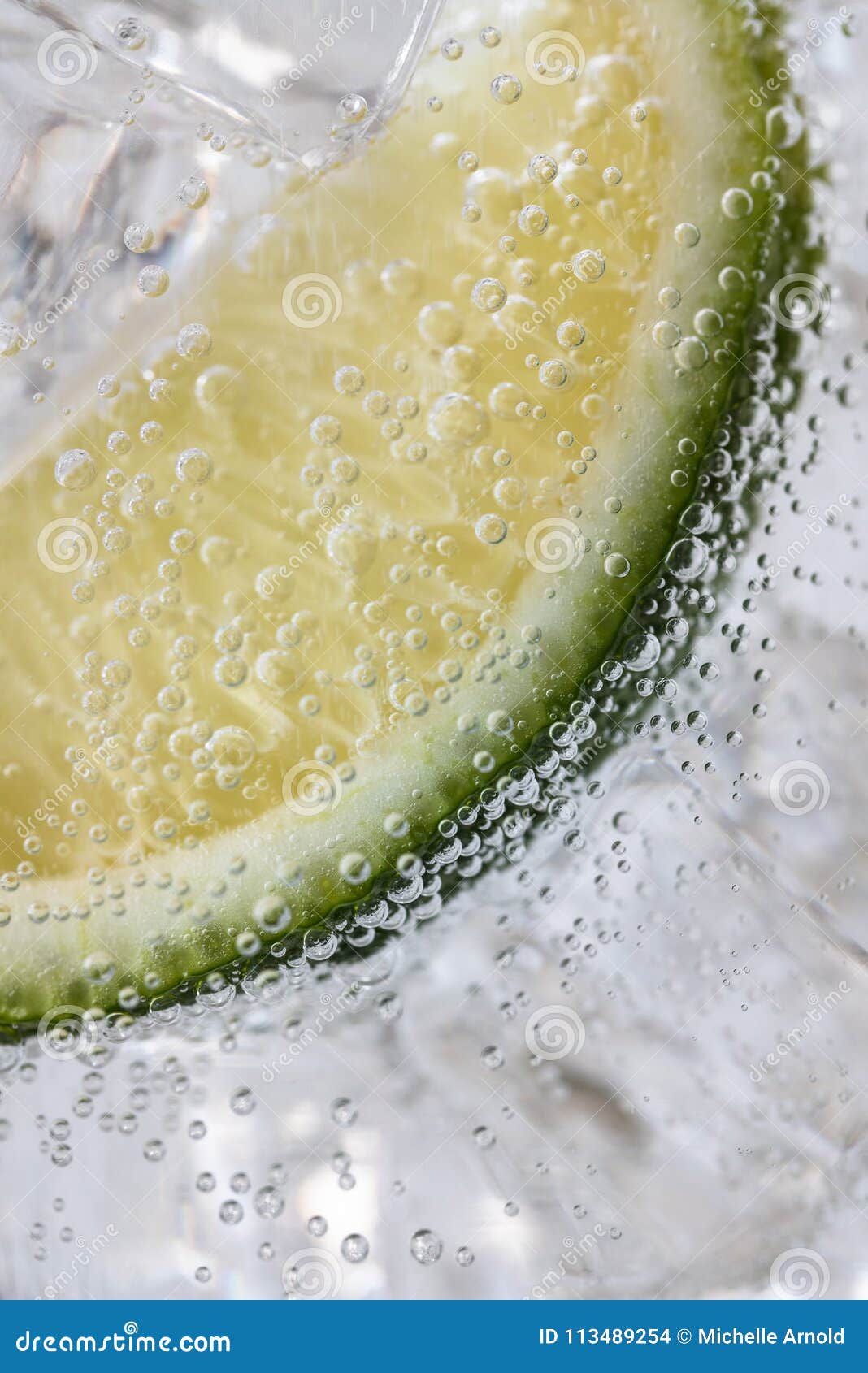 A Lime Wedge in Tonic Water Stock Photo - Image of beverage, slice ...