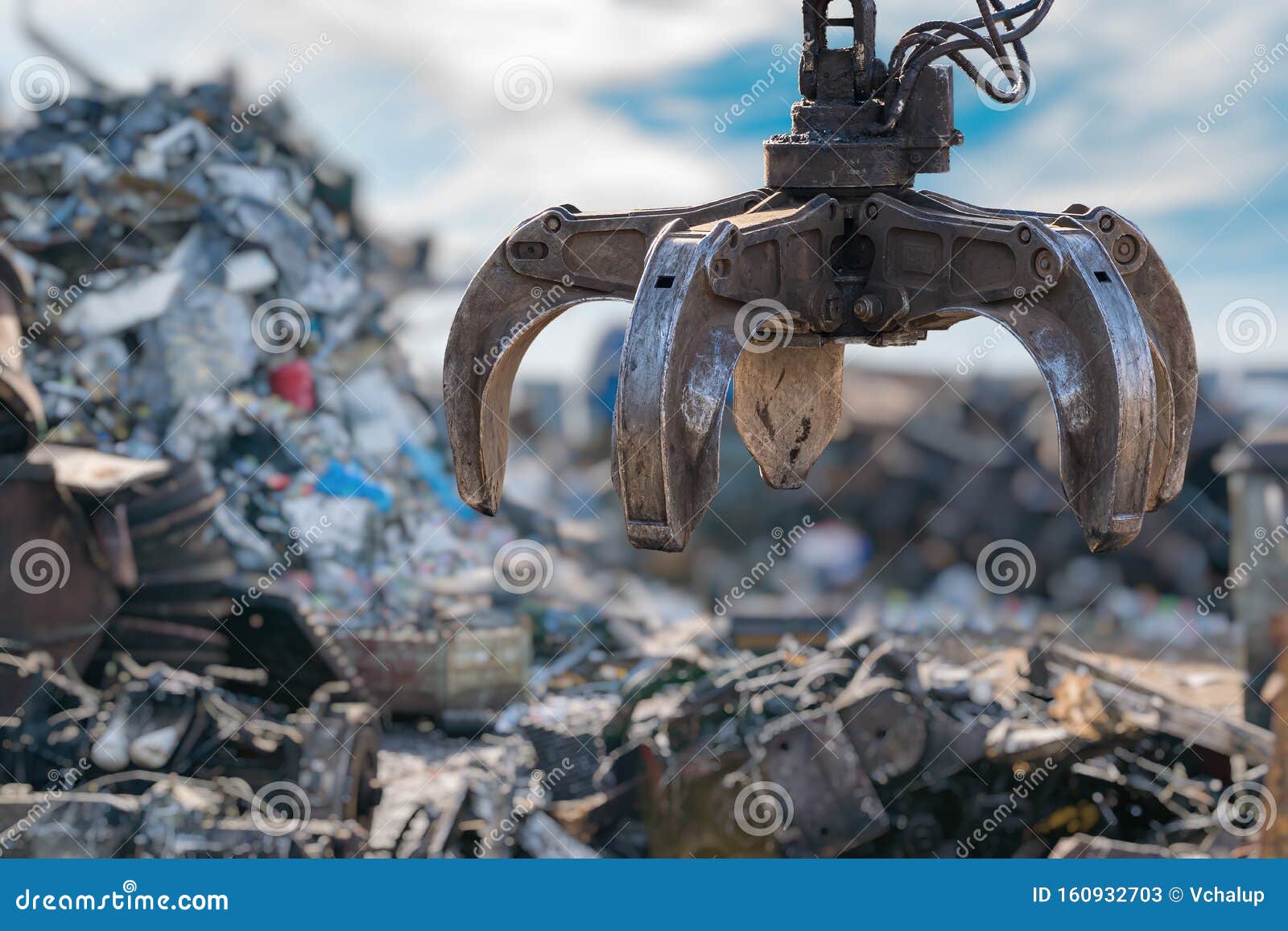 Closeup View on Mechanical Arm Claw of Crane at Landfill. Stock Image