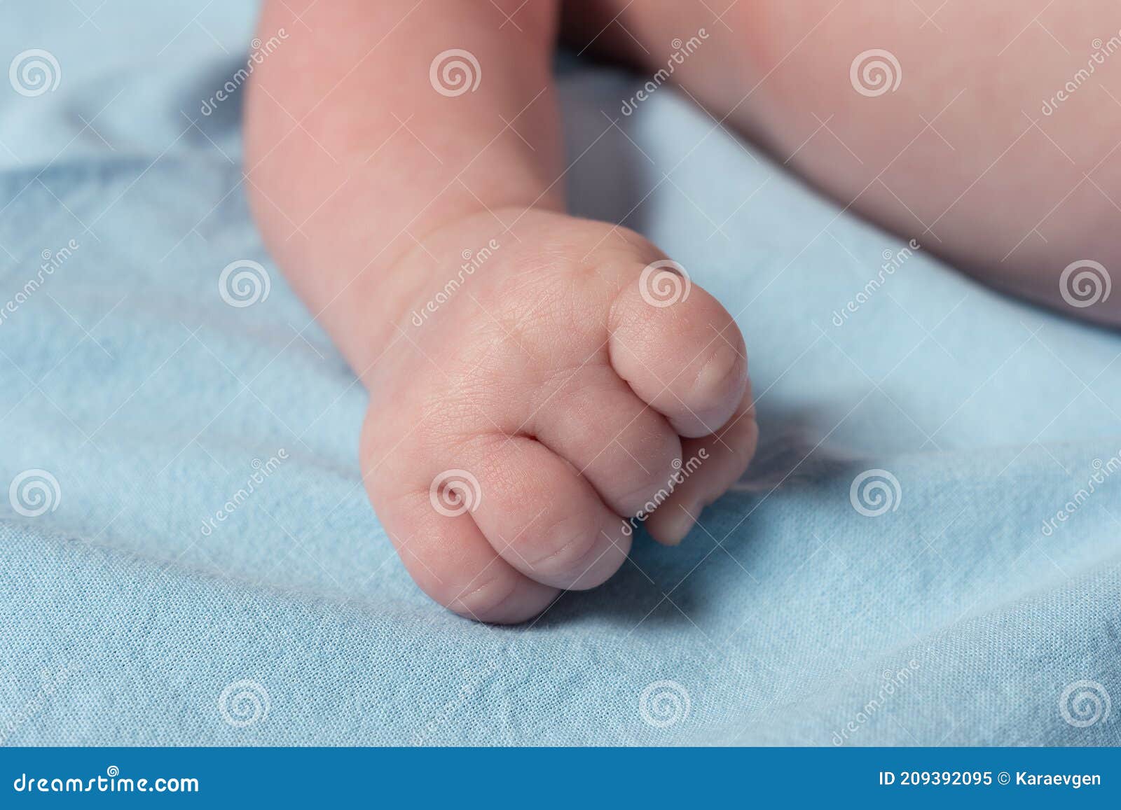 Close Up View of Newborn Baby Hand on a Bed Stock Image Image of