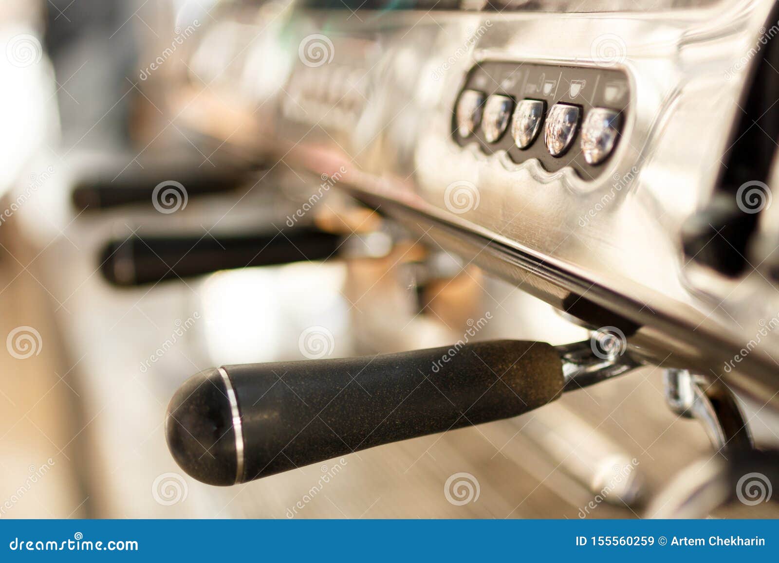 close up view of portafilters handles in a row of professional coffee machine on kitchen. buttons, sunny day, vintage