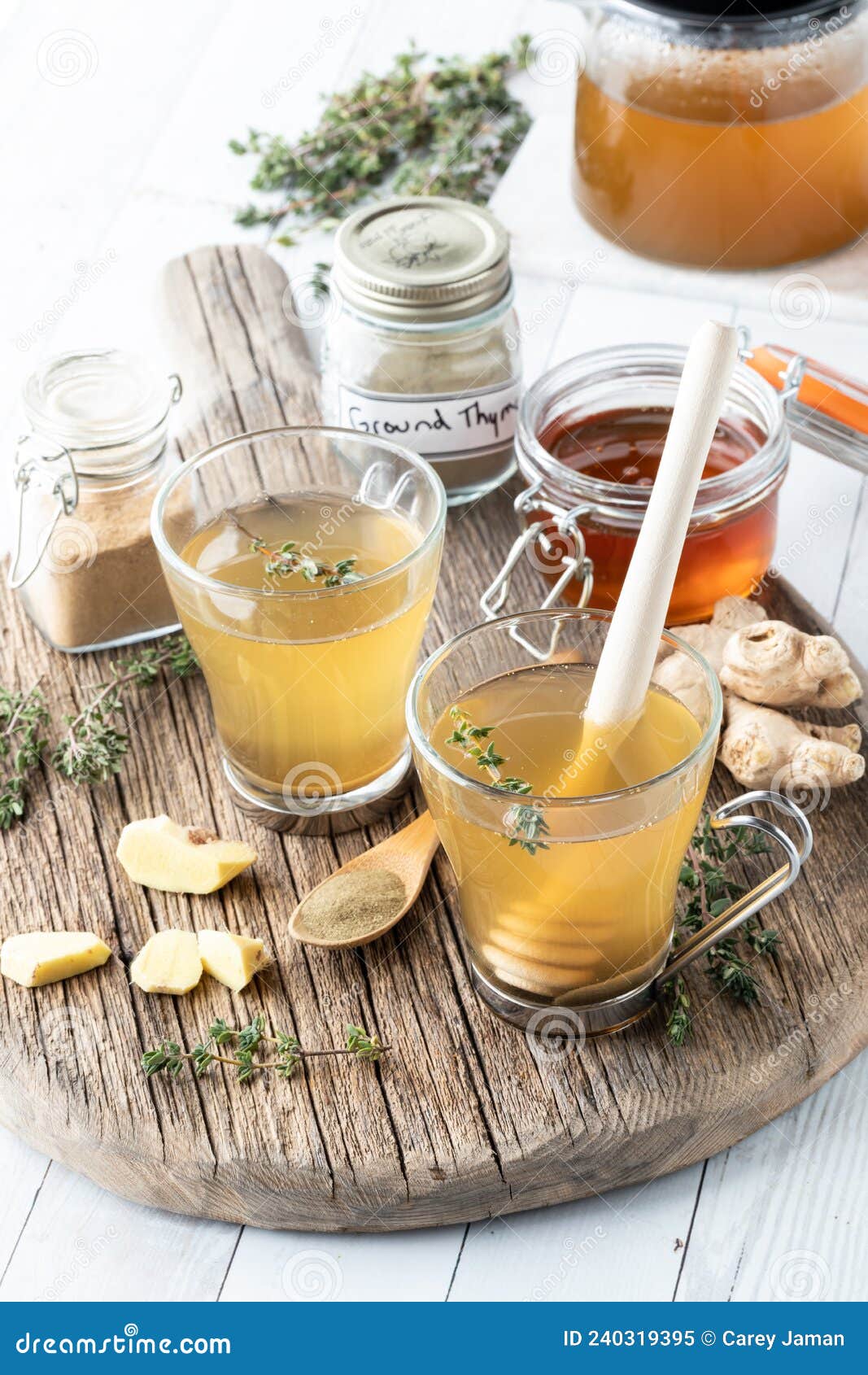 Close Up View of Two Cups of a Medicinal Thyme and Ginger Elixir Tea