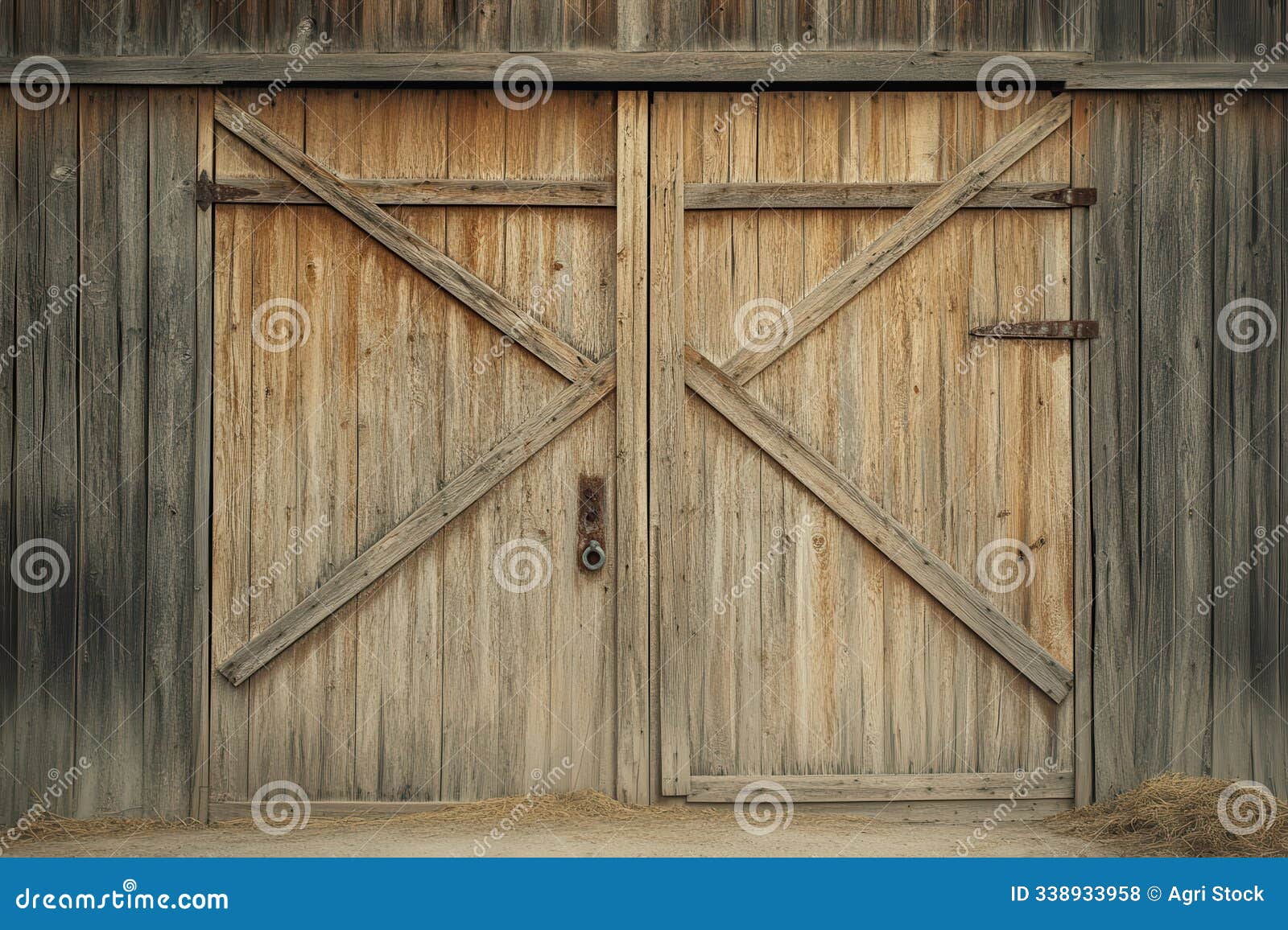 weathered wooden barn doors with x-d braces