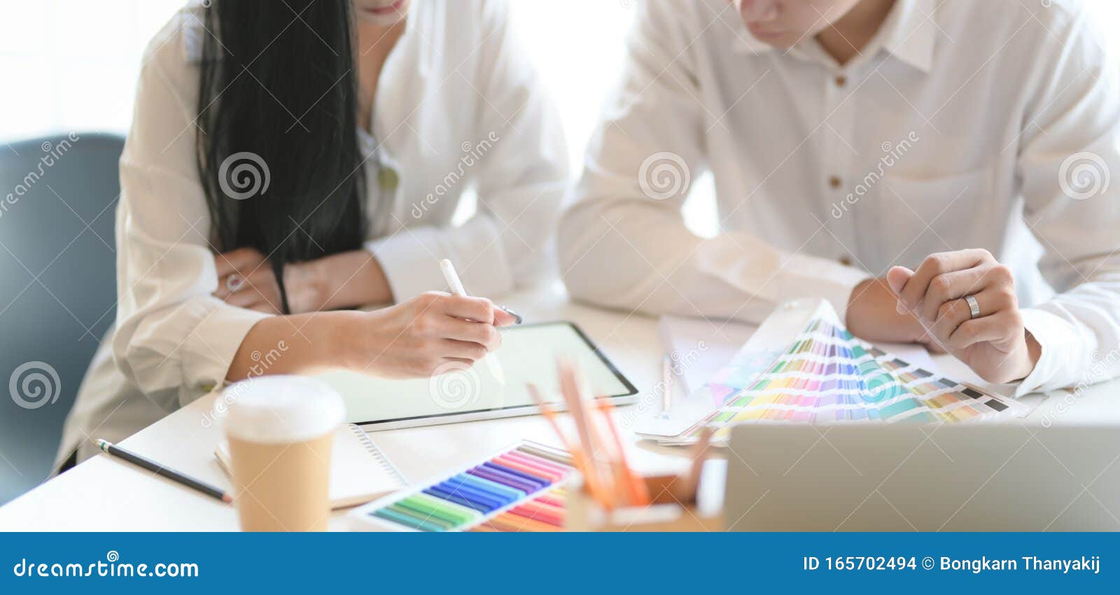 Closeup View of Young Successful Graphic Designer Team Discussing