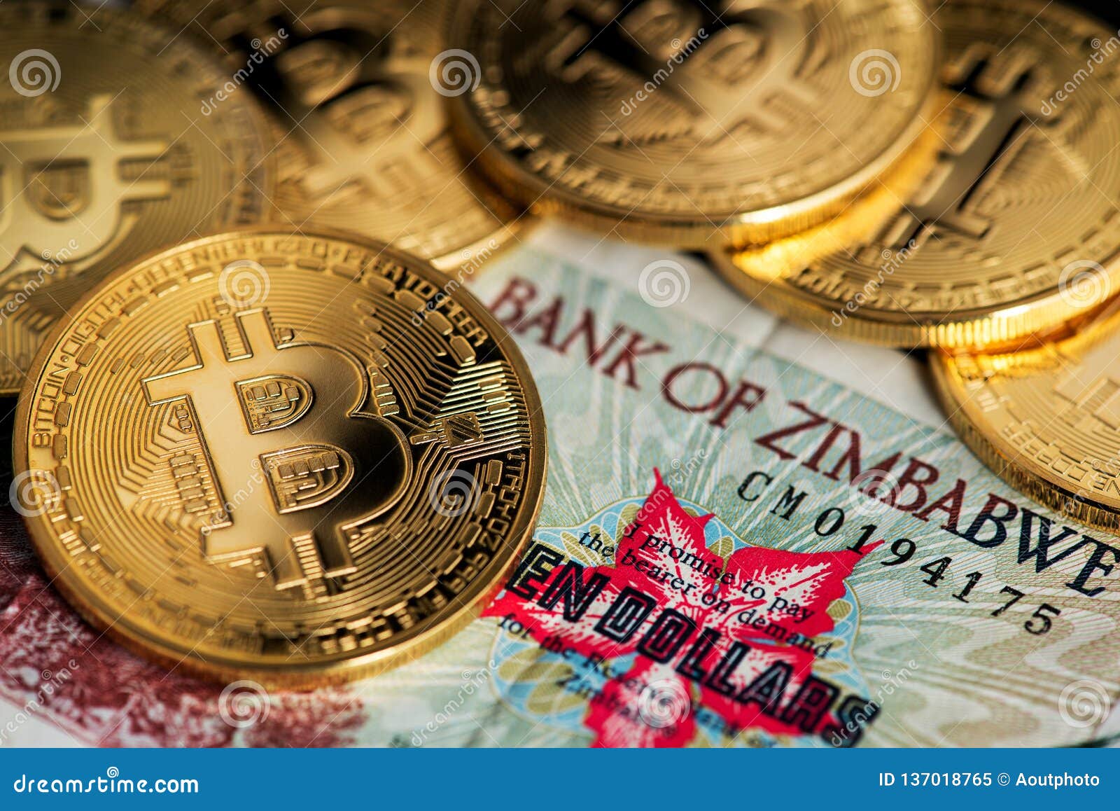 A Close Up View Of Zimbabwe Hyperinflation Banknote And Bitcoin - 