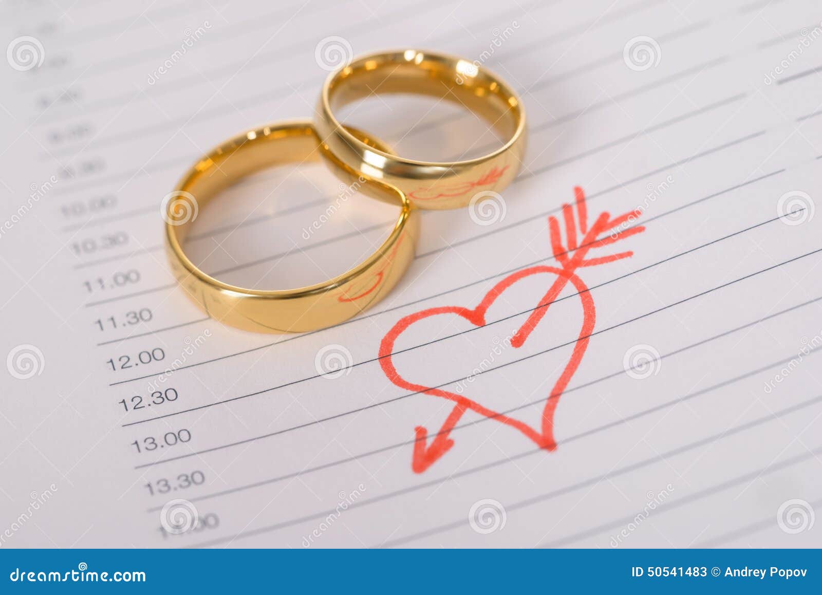 Closeup of Wedding Rings on Paper Stock Image Image of golden, page