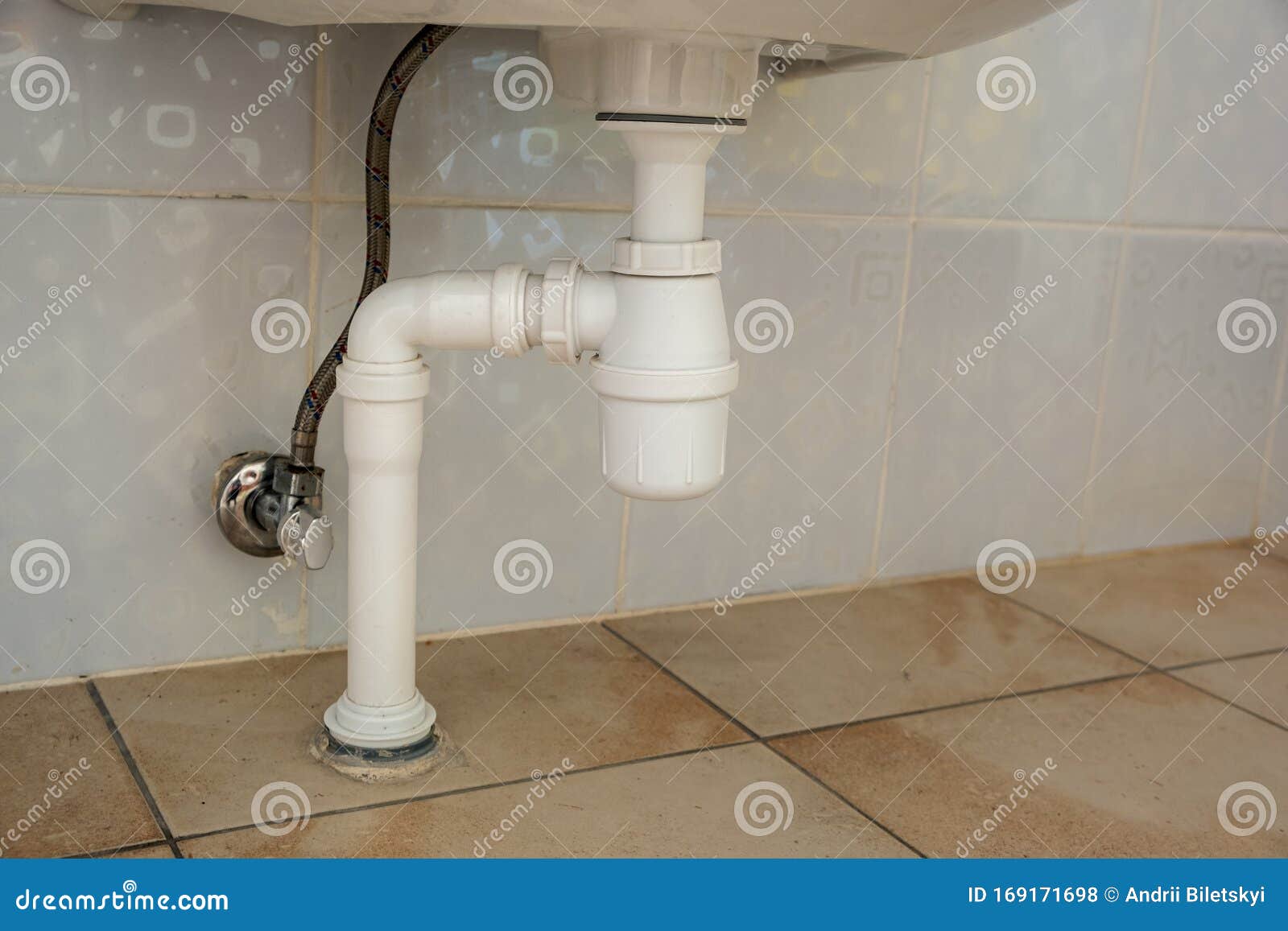Close Up Of White Plastic Pipe Drain Under Washing Sink In Bathroom Stock Photo Image Of Equipment