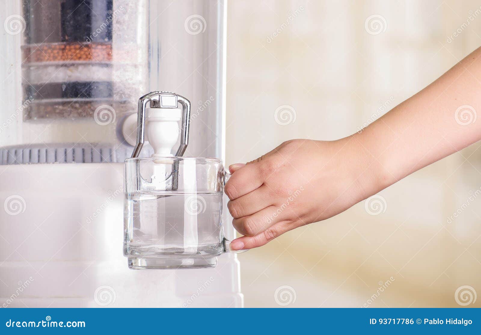 Close Up of a Woman Filling a Glass of Water, with a Filter System of Water  Purifier on a Kitchen Background Stock Photo - Image of drinkingwater,  closeup: 93717786