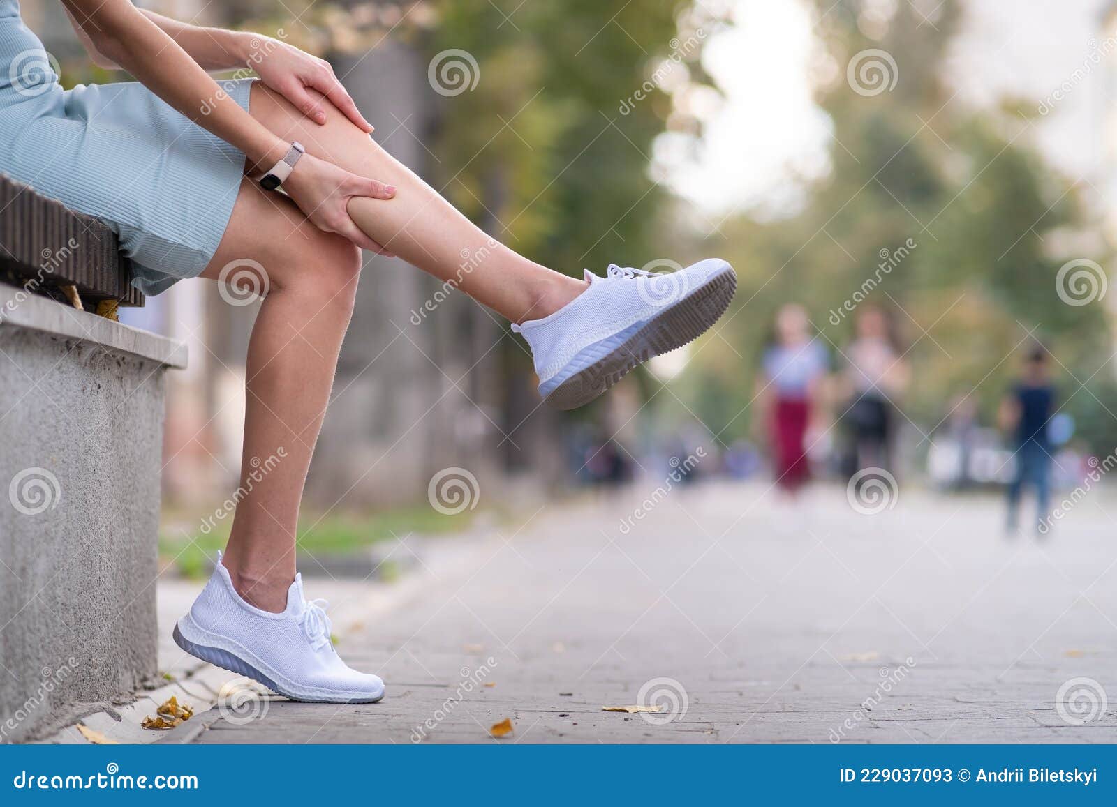 Close Up of Woman Hands Holding Her Knee in Pain Sitting on Bench ...