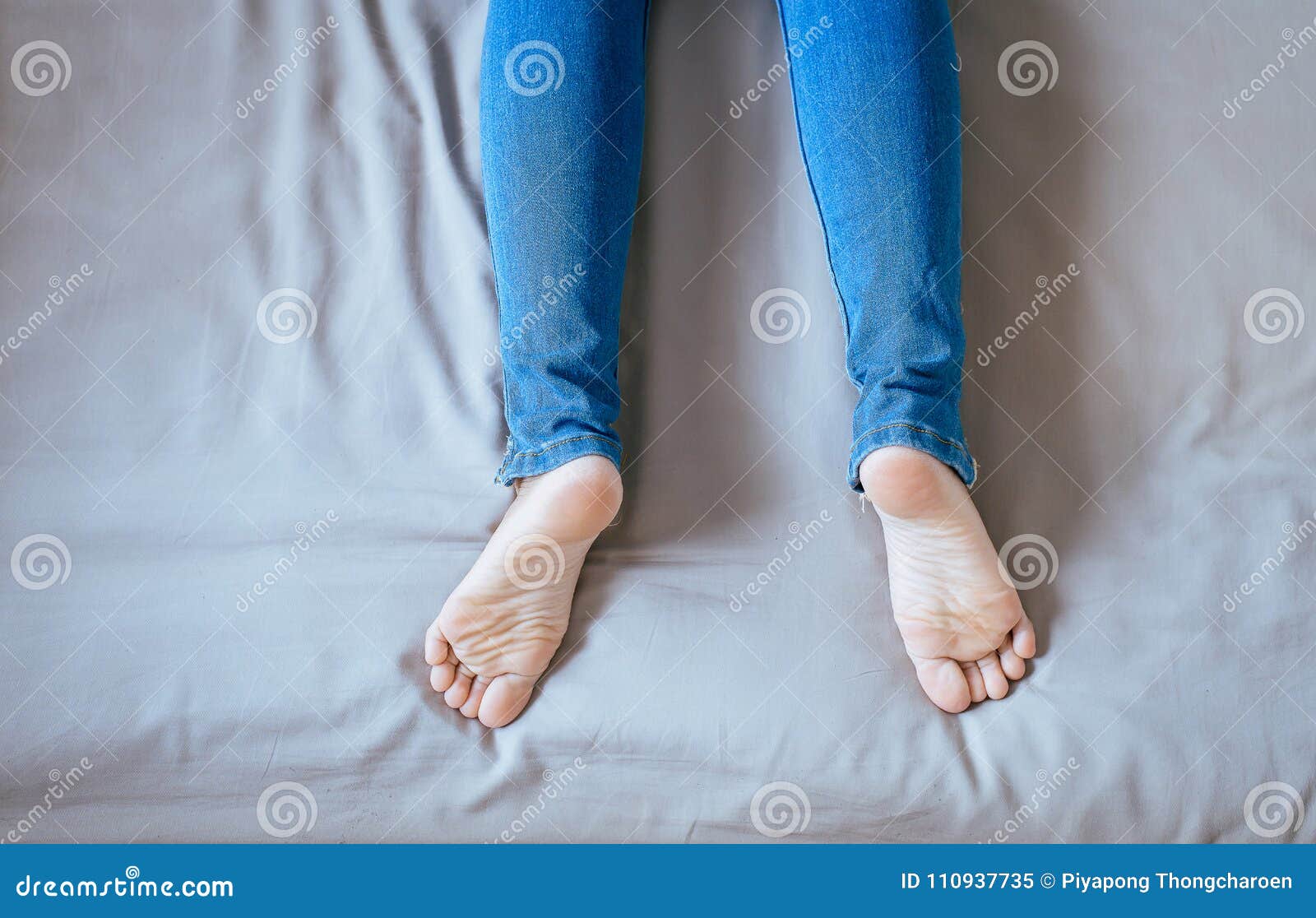 Feet in jeans