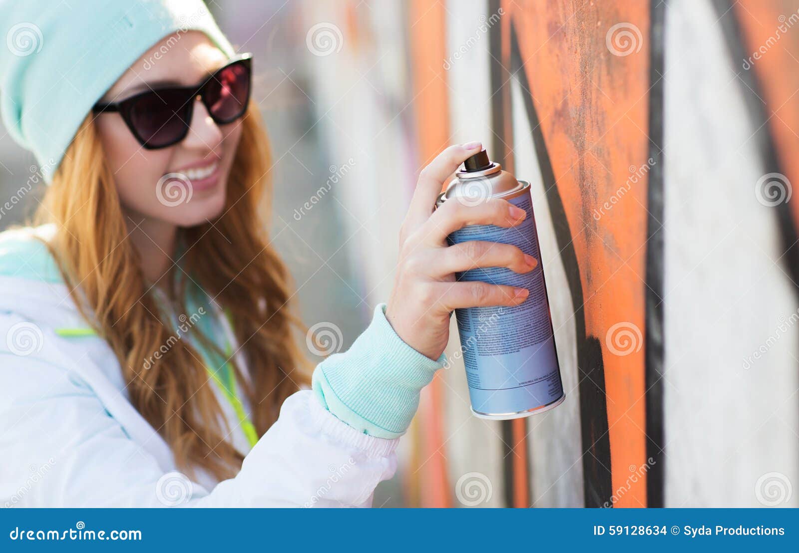 Close Up Of Woman With Spray Paint Making Graffiti Stock ... Close Up Of Woman With Spray Paint Making Graffiti Stock