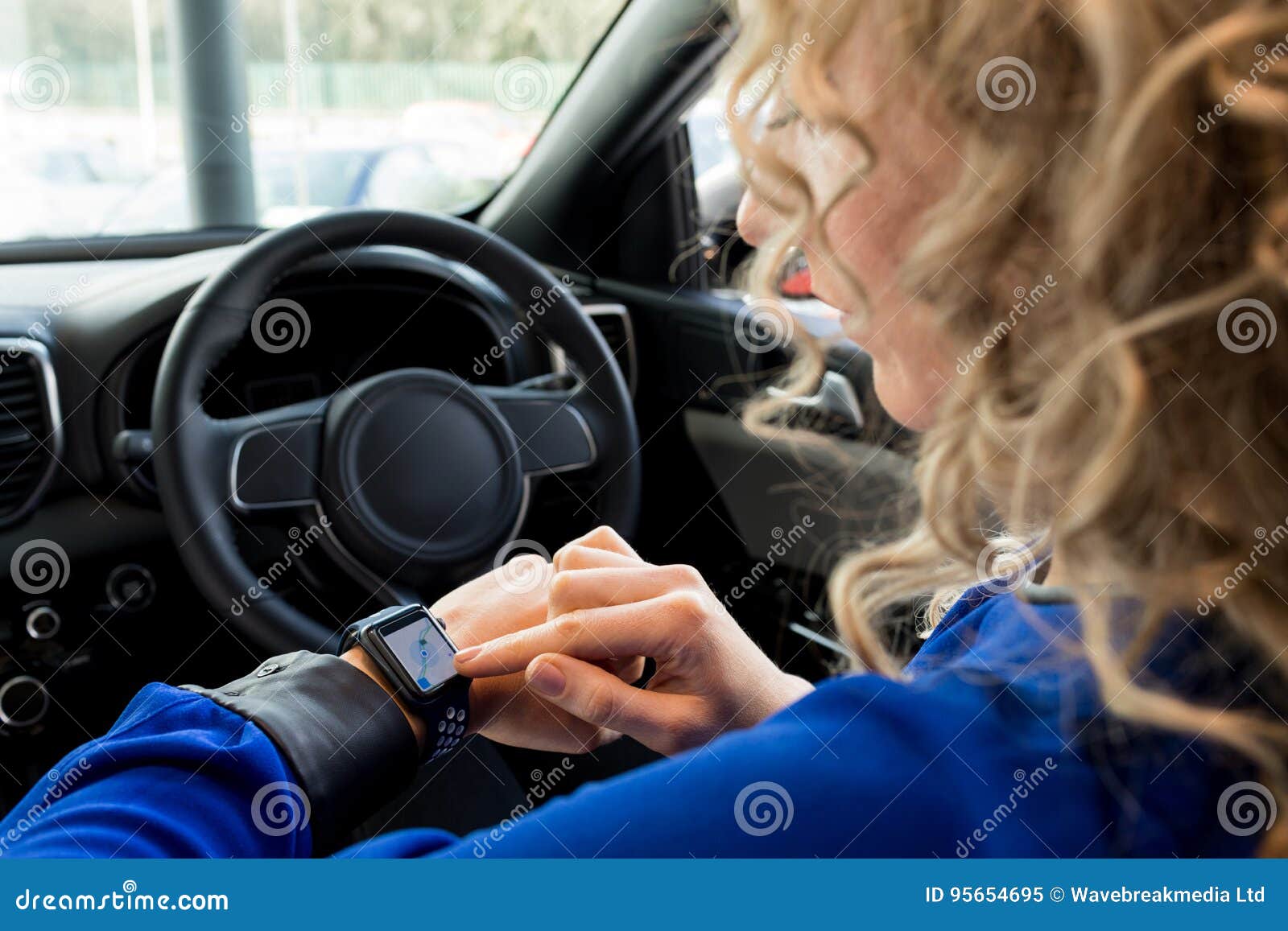 Close Up of Woman Using Smart Watch in Car Stock Image Image of