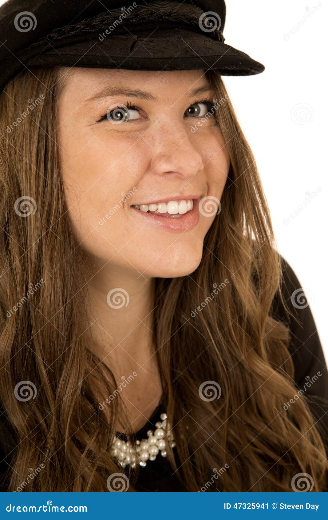 Close-up Woman Wearing a Black Hat Glancing Sideways Stock Image ...