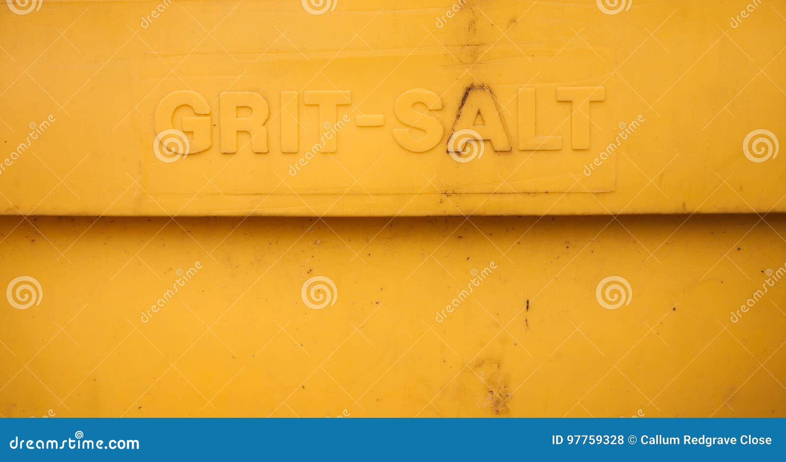 Grit Salt Yellow Bin Near Wall Stock Photography
